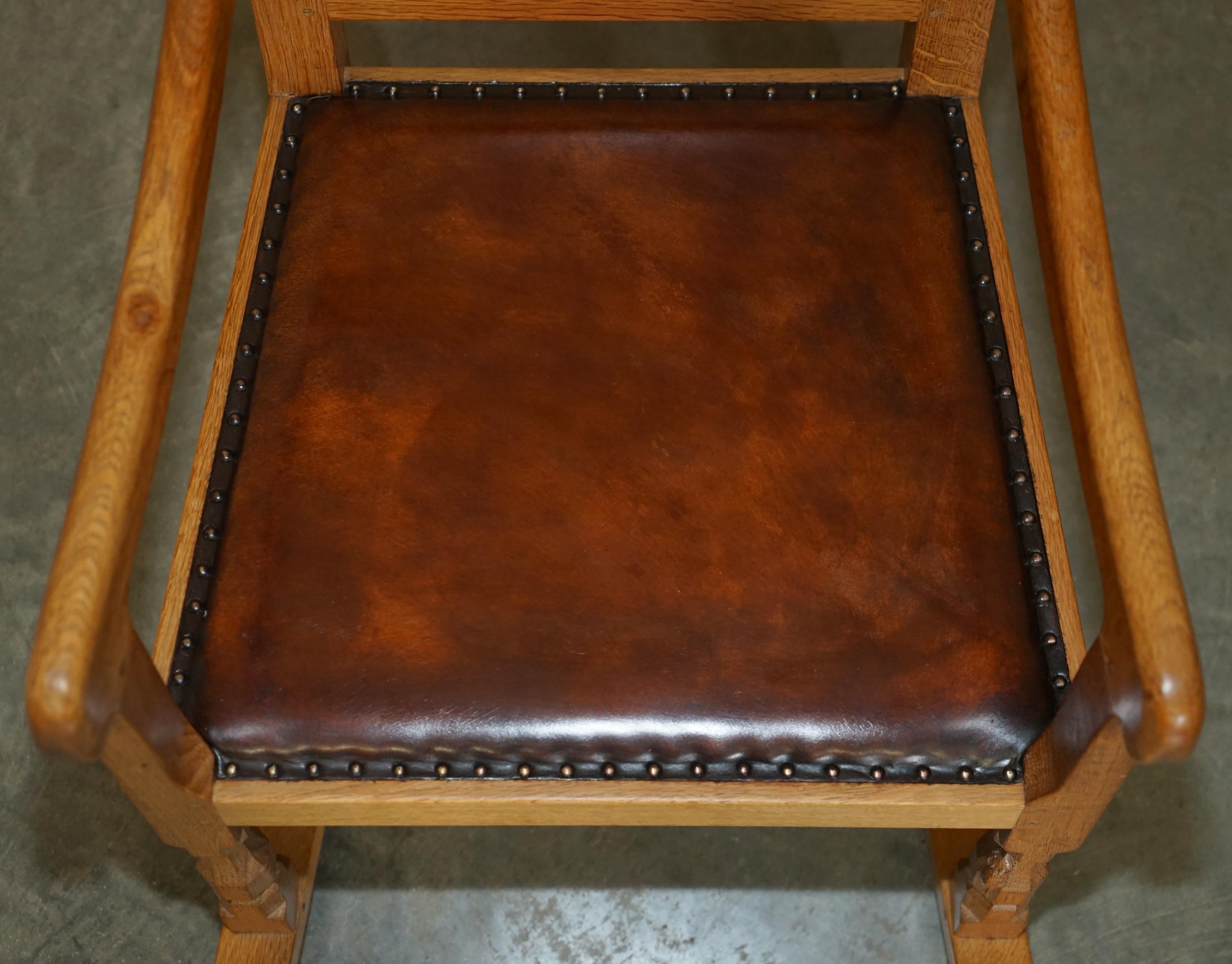 English VINTAGE ROBERT MOUSEMAN THOMPSON ROCKING ARMCHAiR HAND DYED BROWN LEATHER SEAT For Sale