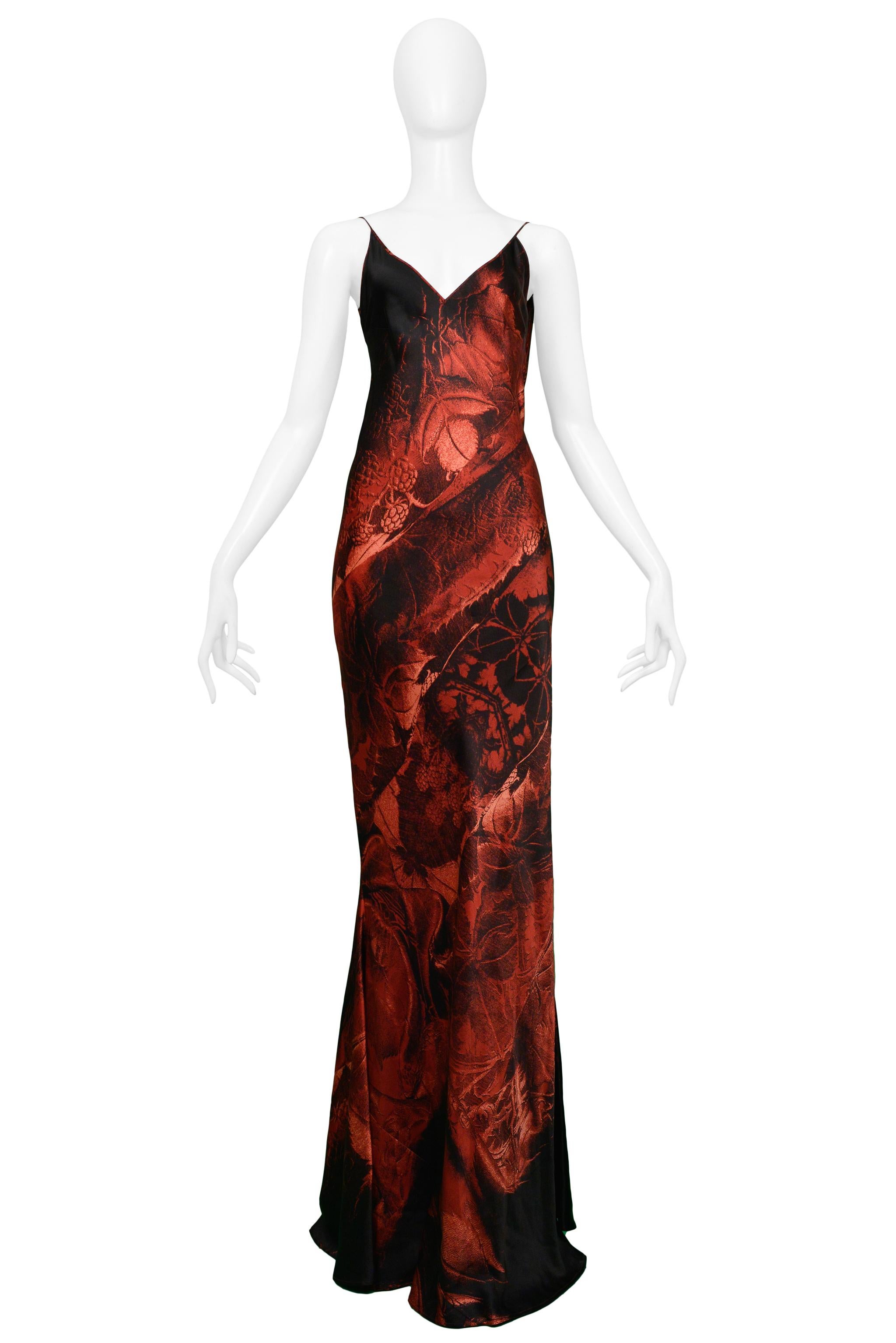 Resurrection Vintage is excited to present a vintage Roberto Cavalli silk evening gown featuring a red and black abstract floral print and draped open back.

Roberto Cavalli
Size: Medium
Silk
Excellent Vintage Condition 
Authenticity Guaranteed 
