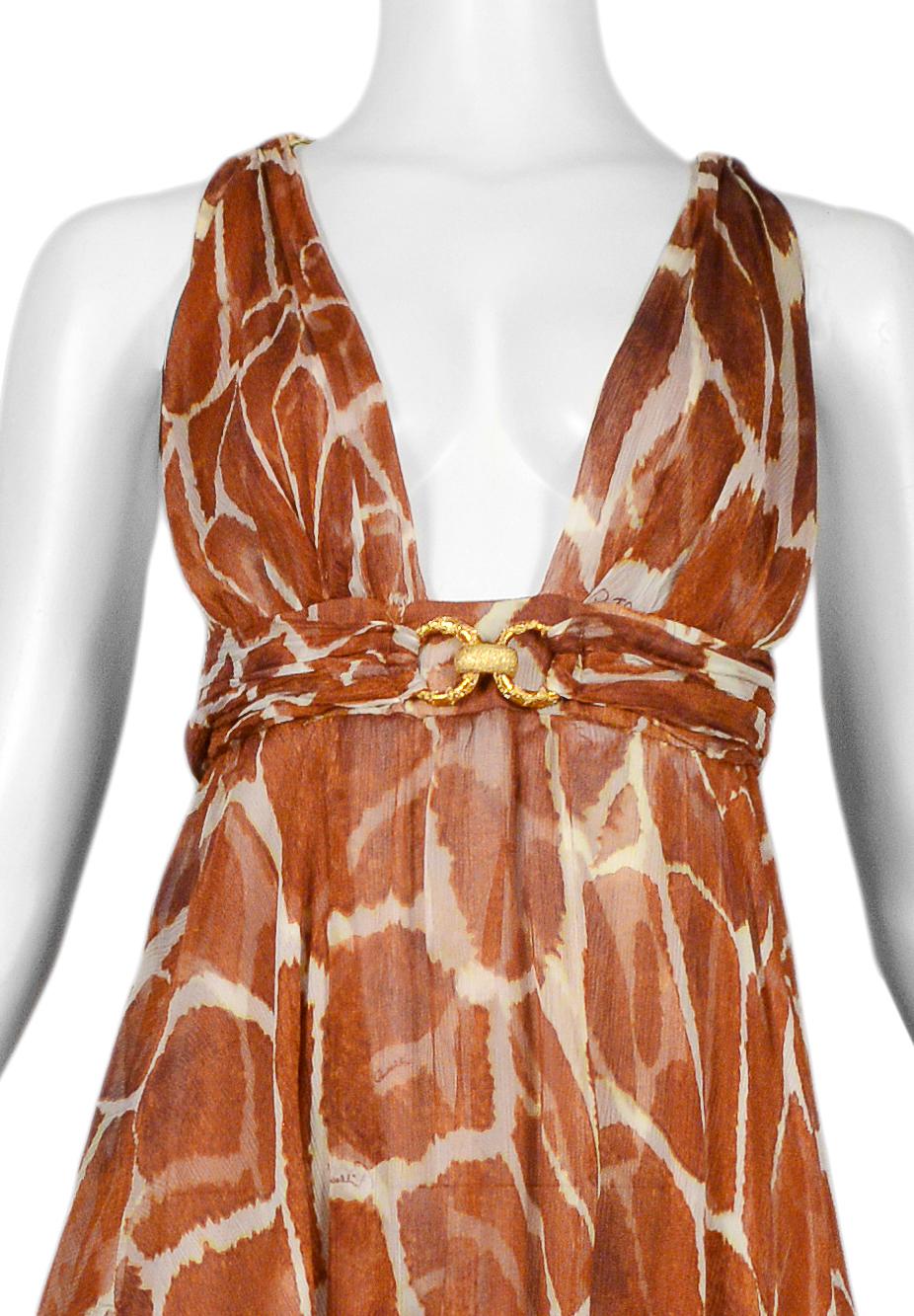 Resurrection Vintage is excited to offer a vintage Roberto Cavalli halter dress featuring an allover giraffe print, deep V, handkerchief hem, and gold clasp at the bust and straps. 

Roberto Cavalli
Size 44
Chiffon
Made In Italy
2006