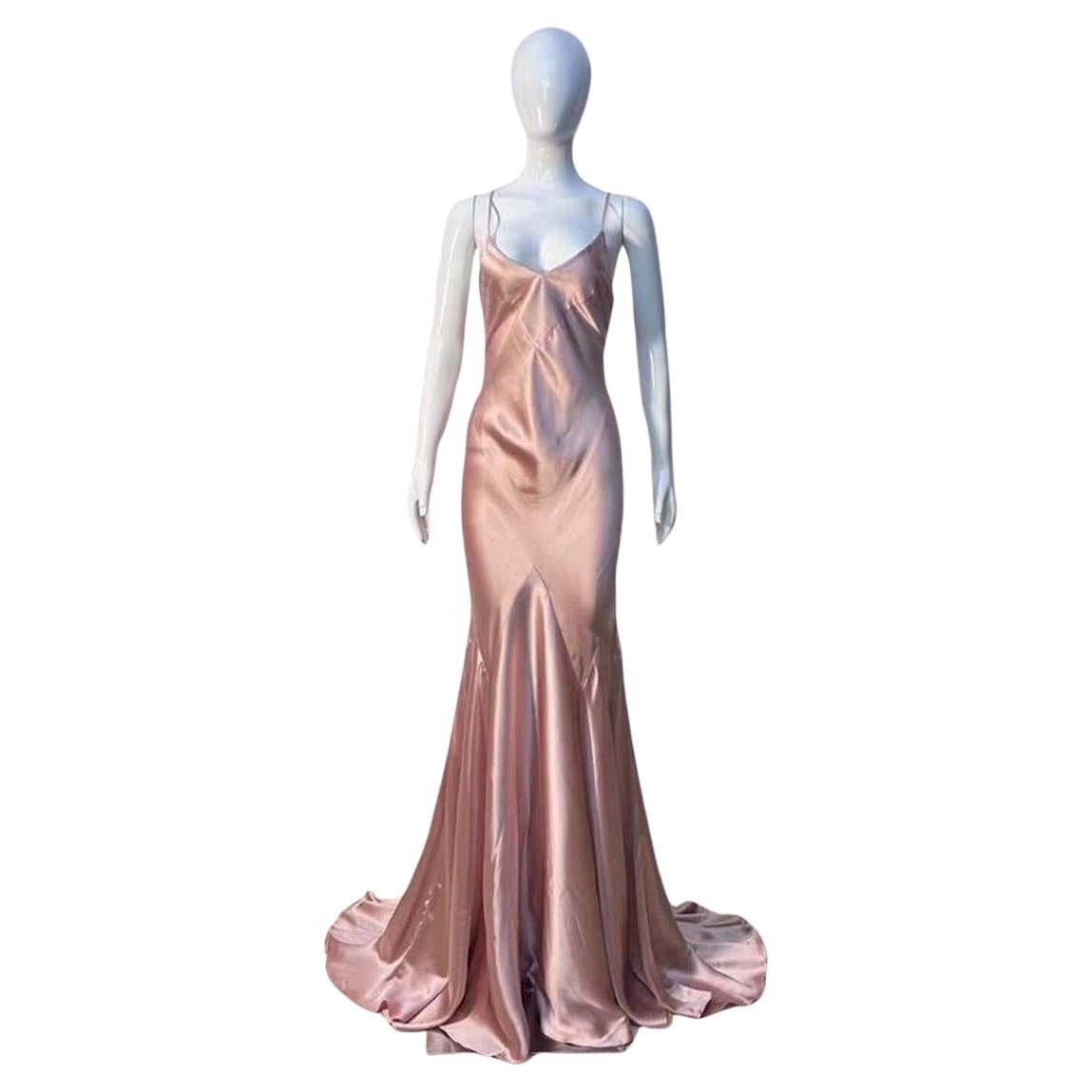 Roberto Cavalli pink bodycon maxi Dress. Features a pink satin silk fabric, spaghetti straps and mermaid shape. In excellent vintage condition.

Brand: Roberto Cavalli
Size: UK 8
Color: Multi
Label size: Small
Modern size: UK: 8 to 10, US: 2 to 6,