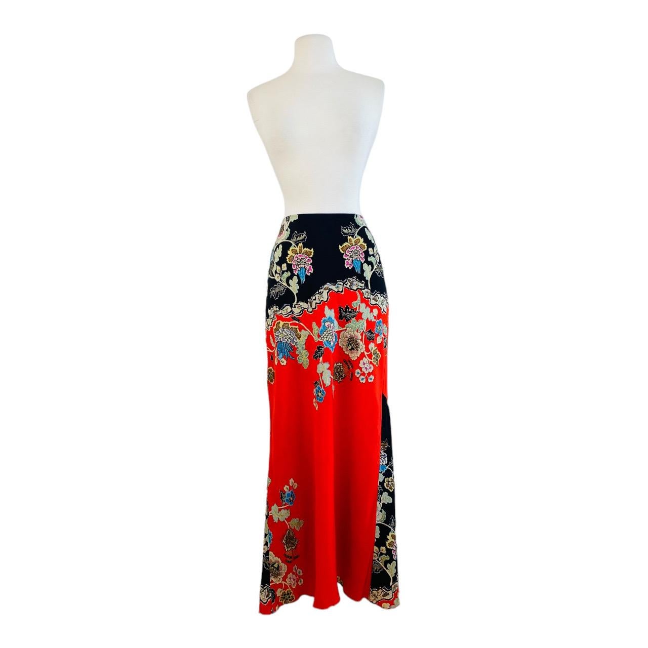 Incredible S/S 2003 Roberto Cavalli Skirt (shown pinned)
Chinoiserie collection
Red + black silk fabric with oversized bold floral print with gold glitter painted style accents
Elastic waistband
Maxi length
Slightly flared hemline
Unlined

Marked L,