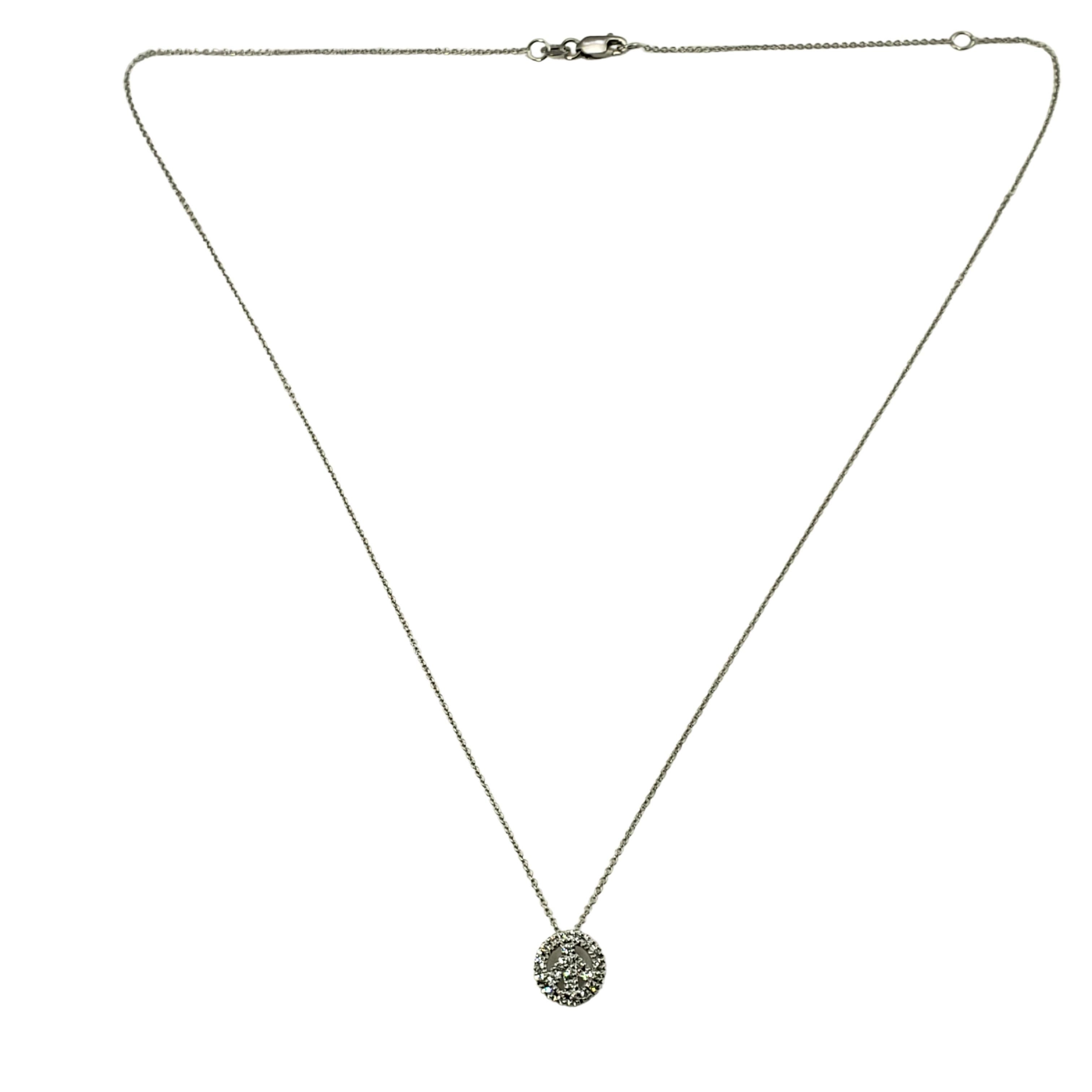 tiffany and co peace sign necklace