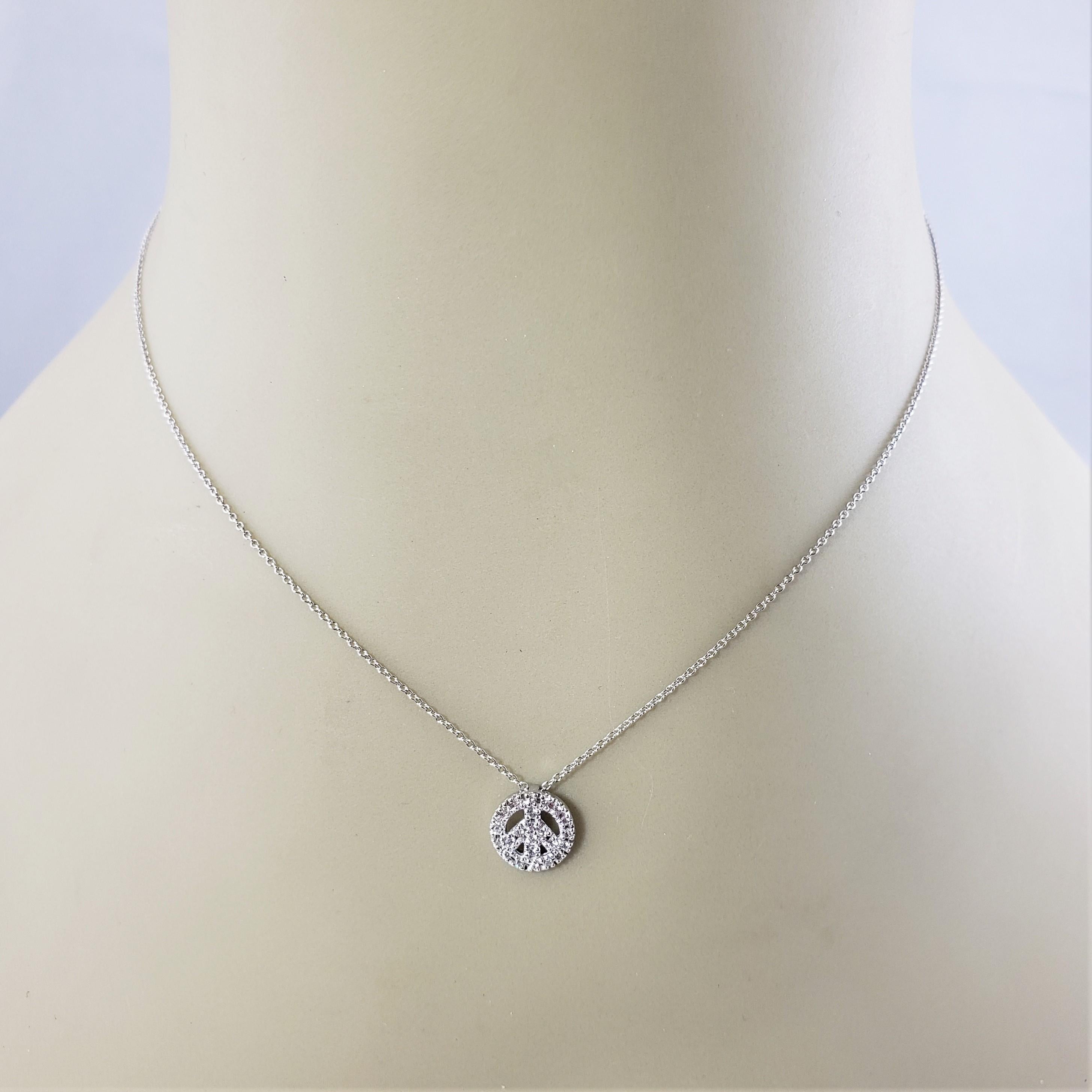 Vintage Roberto Coin 18 Karat White Gold Diamond Peace Sign Pendant Necklace In Good Condition In Washington Depot, CT