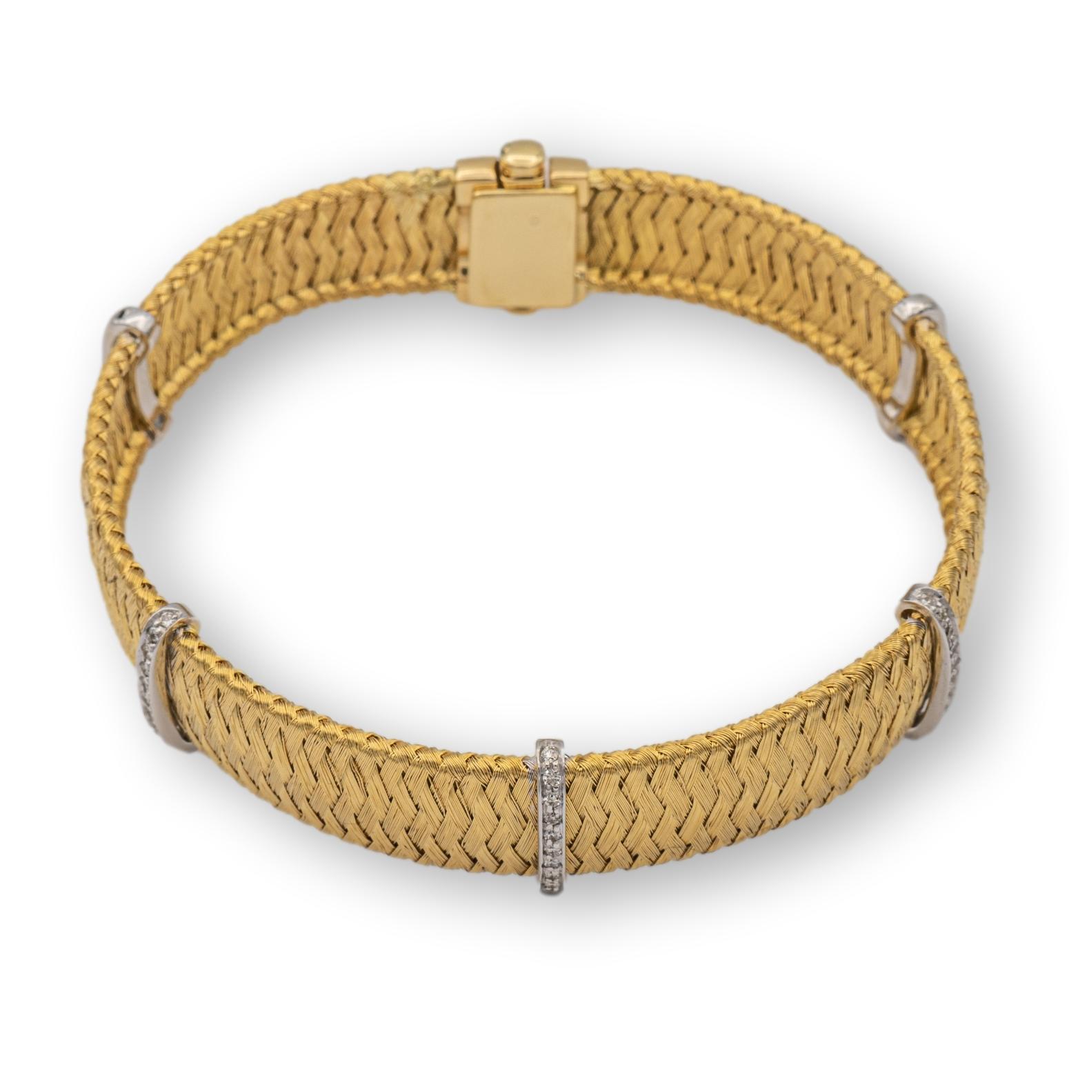 Vintage Roberto Coin silk weave bracelet finely crafted in 18 Karat yellow gold featuring 5 bar stations in 18 karat white gold , 3 of them studded with bead set round brilliant cut diamonds weighing 0.35 cts total weight approximately. Bracelet