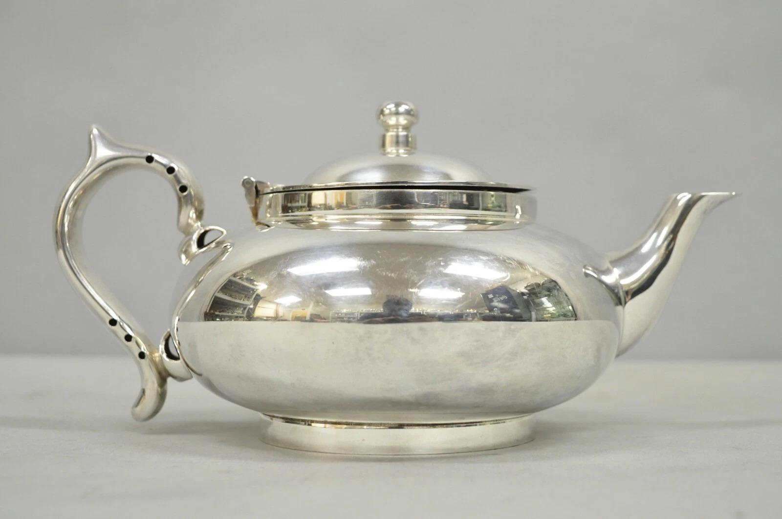 Tetera vintage Robur Challenge EPNS 'Perfect Tea-pot' bañada en plata. Mediados del siglo XX. Medidas: 4,5