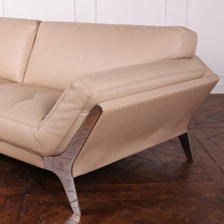 Lovely-quality comfortable vintage Roche Bobois leather sofa with canted arms and standing on stainless steel angled legs. In excellent original condition with virtually no wear or signs of age. C. 1990s – 2000s.