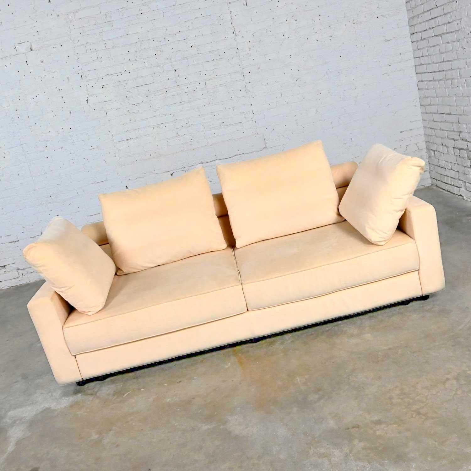 Gorgeous Roche Bobois vintage postmodern off-white ultra-suede sofa. Beautiful condition, keeping in mind that this is vintage and not new so will have signs of use and wear. There are stains several places on sofa, but we have not attempted to