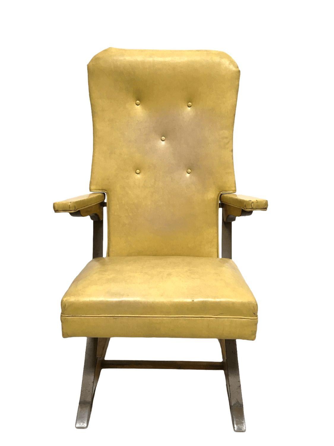 Vintage rock-a-chair cantilever rocker chair in Harvest Gold Vinyl. $1,450
 
This Mid-Century Style Cantilever Rocker Chair features a harvest gold vinyl. Originally manufactured by Aldeuman Acres Manufacturing, its frame combines wood and metal