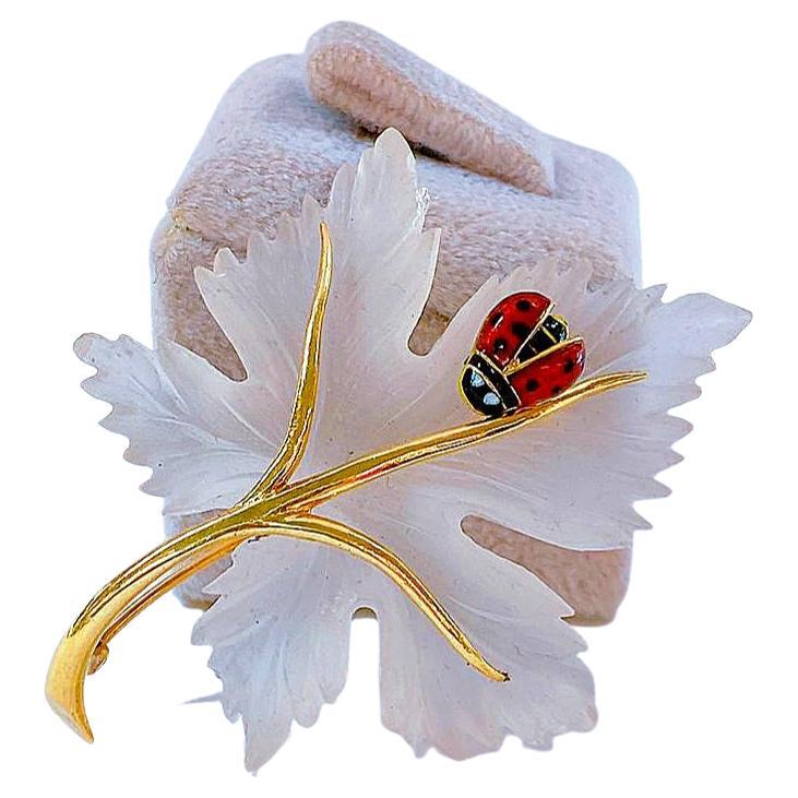 Vintage 14k gold rock crystal brooch in leaf design with enamel lady bird on top brooch messures 5cm hall marked 14k gold 