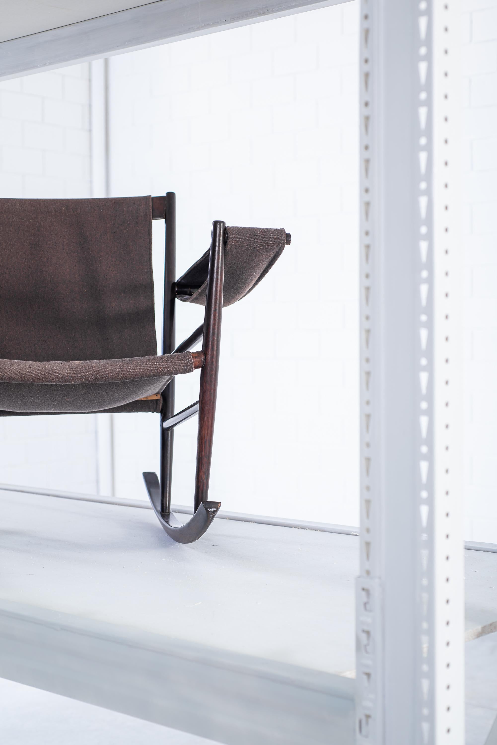 Rosewood Vintage Rocking Chair by Joaquim Tenreiro