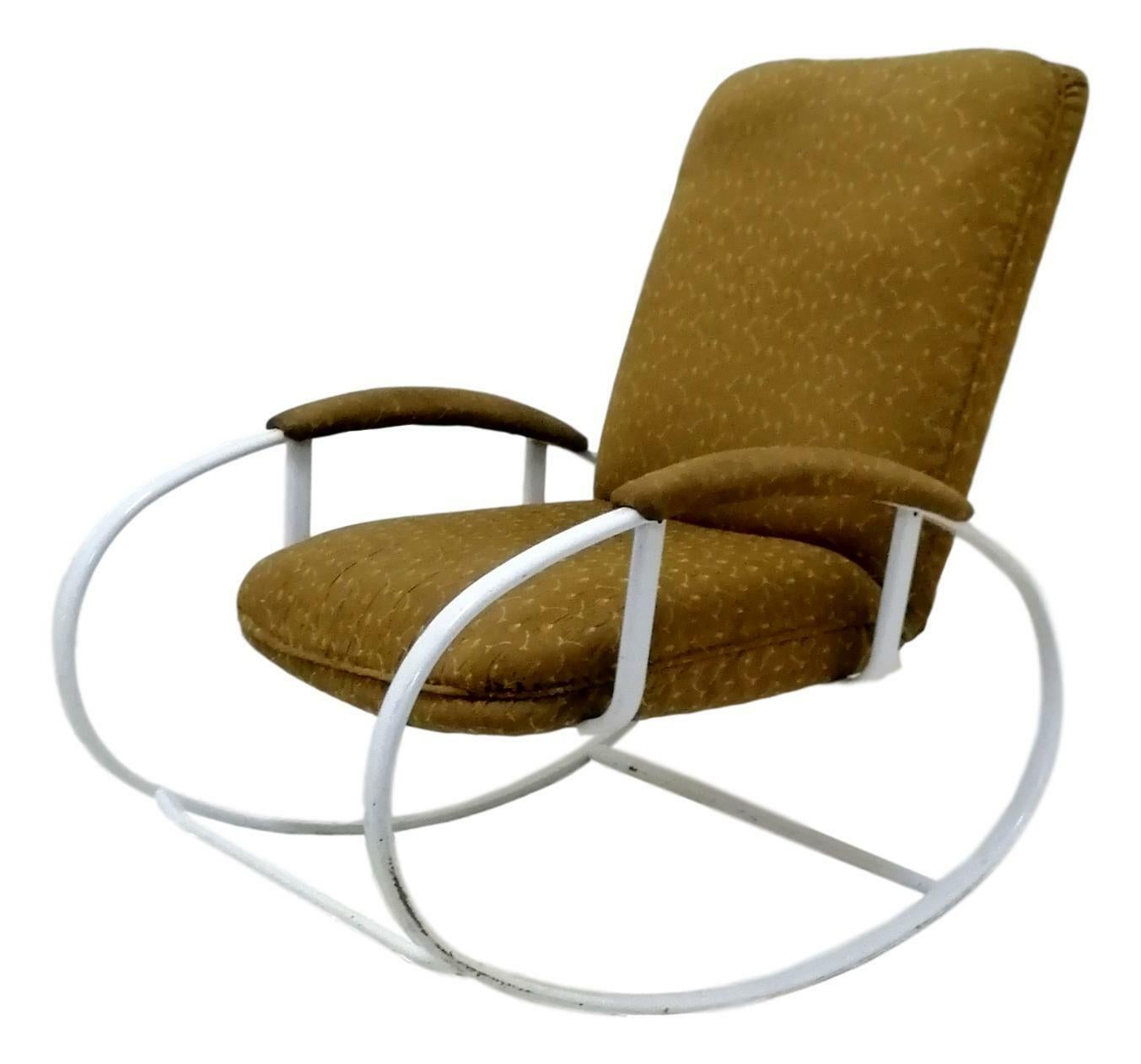 Original rocking chair from the 70s, probably attributed to renato zevi design, on a white lacquered metal structure and fabric upholstery

Good overall condition, as shown in the photos.