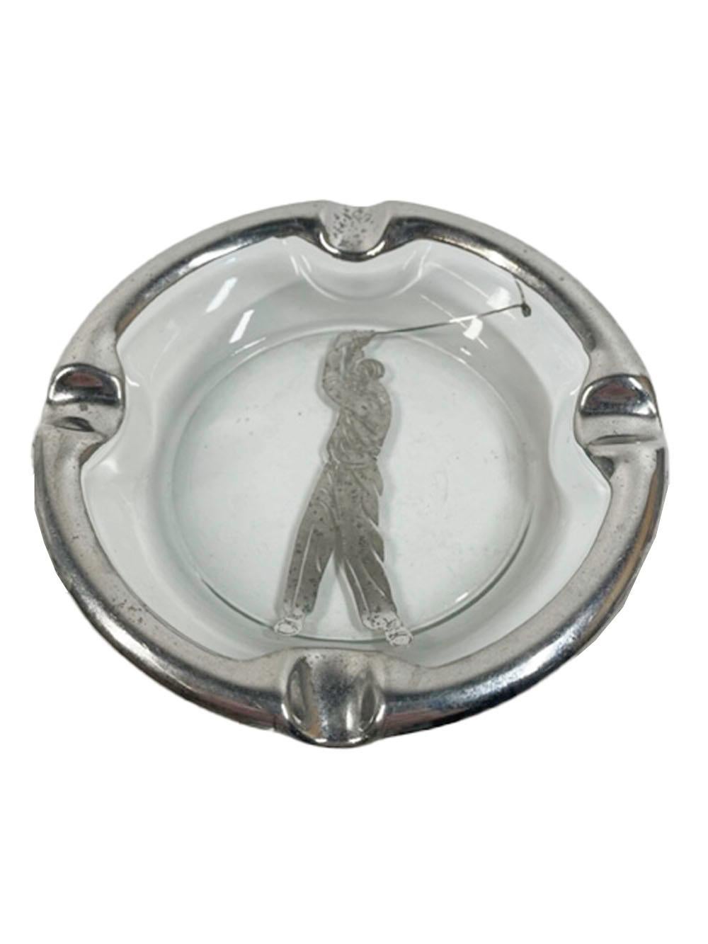 Vintage silver overlay ashtray by the Rockwell Silver Company, of circular form with a 4-divot silver overlay rim centering a golfer swinging his club.