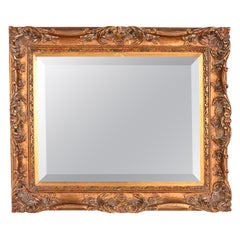Vintage Rococo Carved Giltwood Beveled Wall Mirror Vintage Rococo Carved Giltwood Beveled Wall Mirror