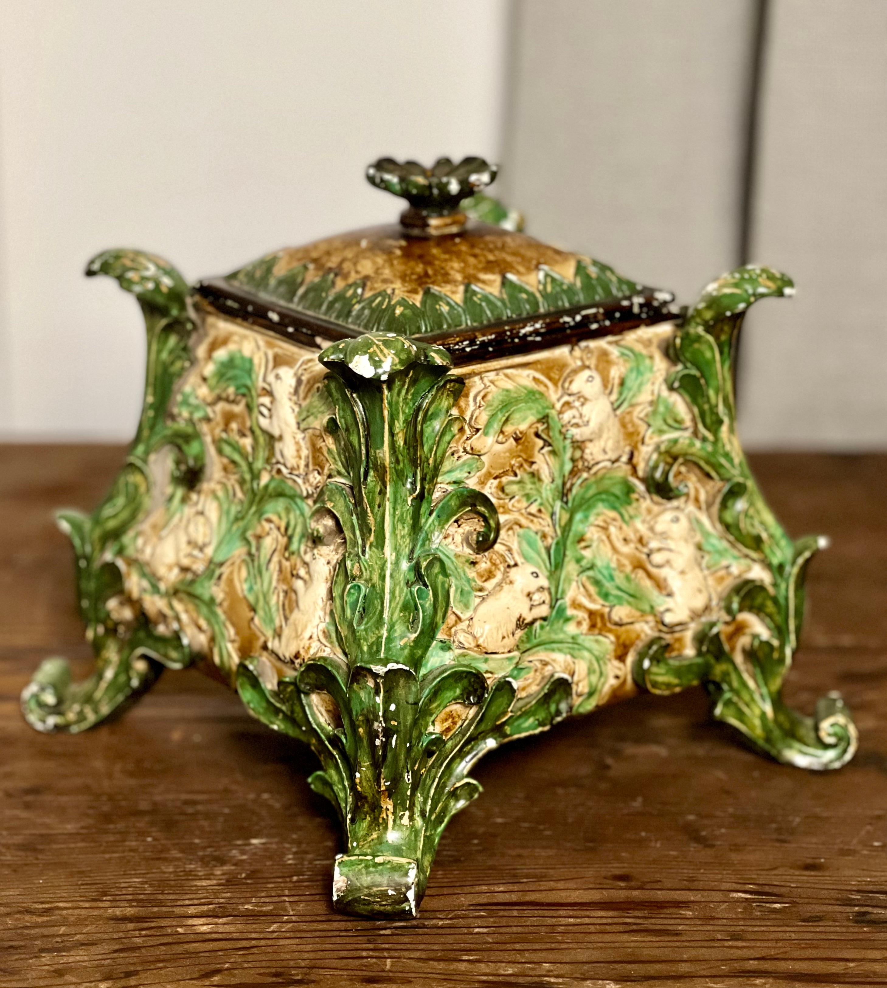 Vintage Rococo style large resin composite table box, c. mid 20th century.

Gorgeous paint decorated, lidded box with high relief detail of charming rabbits and fluid leaf foliage. Inspired by 18th century designs, the box is crafted of a high