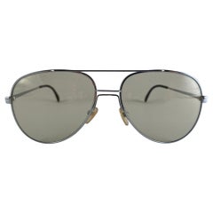 Gafas de sol vintage Rodenstock con montura plateada extragrande y lentes intercambiables Años 70