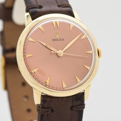 Vintage Rolex 14 Karat Yellow Gold Watch with a Salmon Dial, 1960s