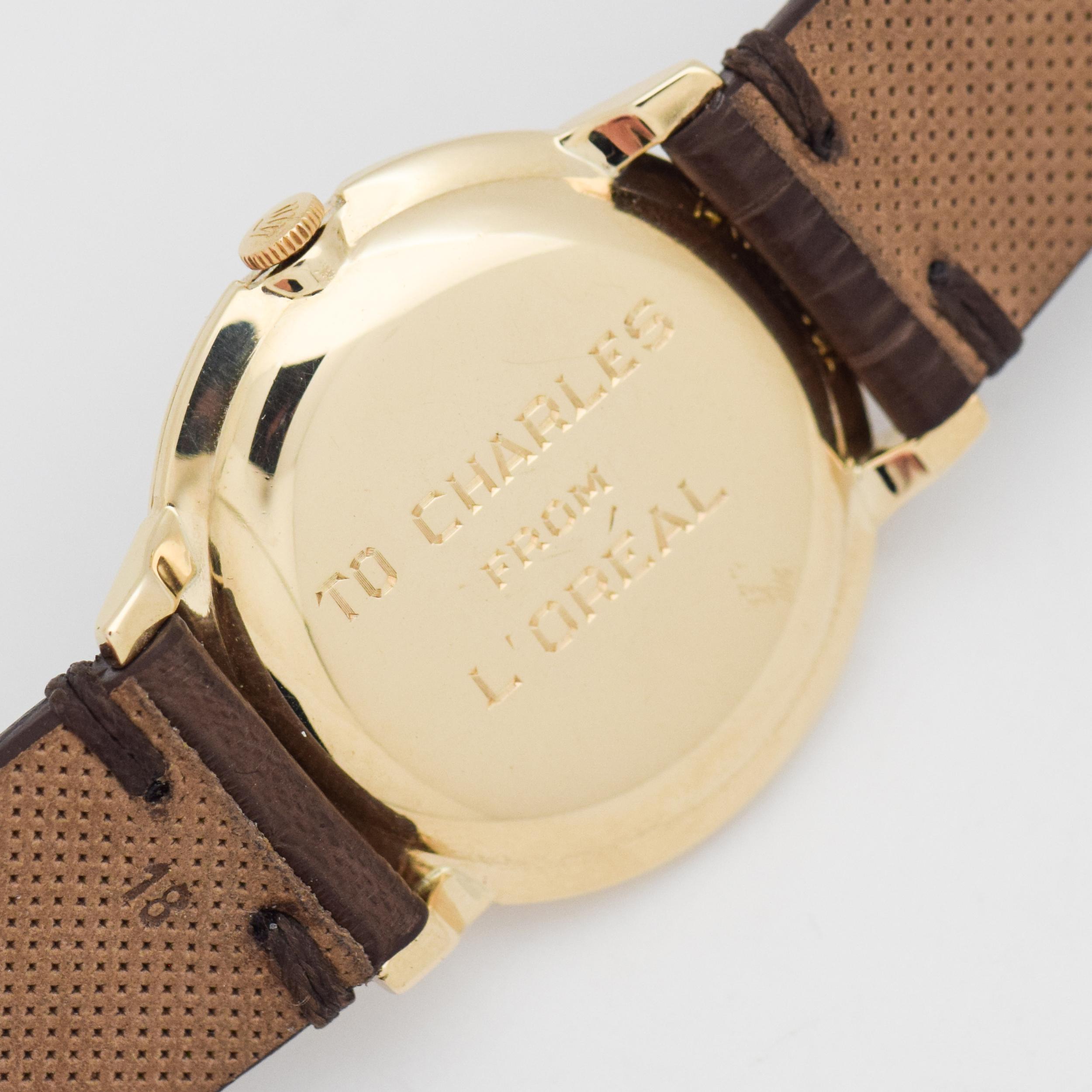Vintage Rolex 14 Karat Yellow Gold Watch with a Salmon Dial, 1960s In Excellent Condition For Sale In Beverly Hills, CA