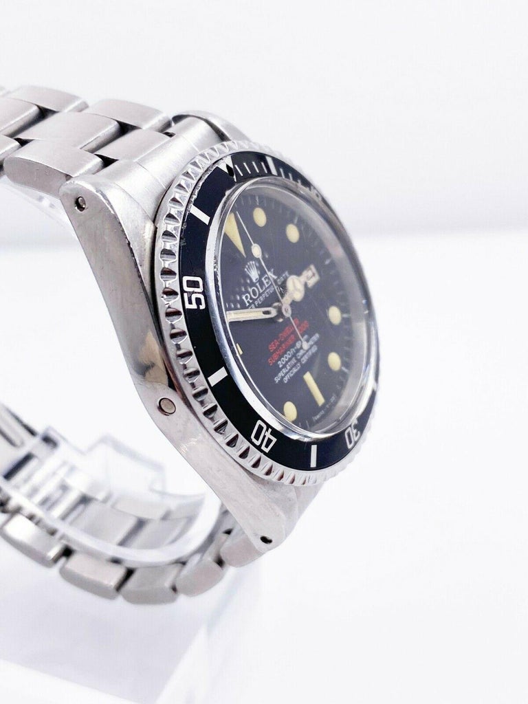 Style Number: 1665

 

Serial: 3066***


Year: 1972

 

Model: Sea Dweller 

 

Case Material: Stainless Steel 

 

Band:  Stainless Steel

 

Bezel:  Black

 

Dial: Black DOUBLE RED SEA DWELLER

 

Face: Acrylic 

 

Case Size: 40mm

 

Includes: