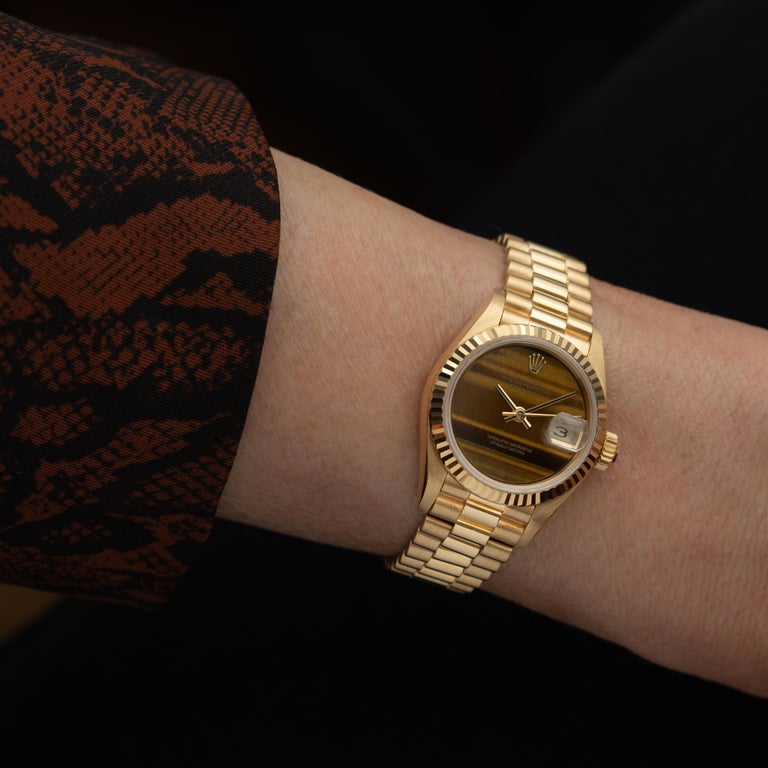 Women's Vintage Rolex 18 Karat Yellow Gold and Tiger's Eye DateJust Model 69178 c. 1991  For Sale