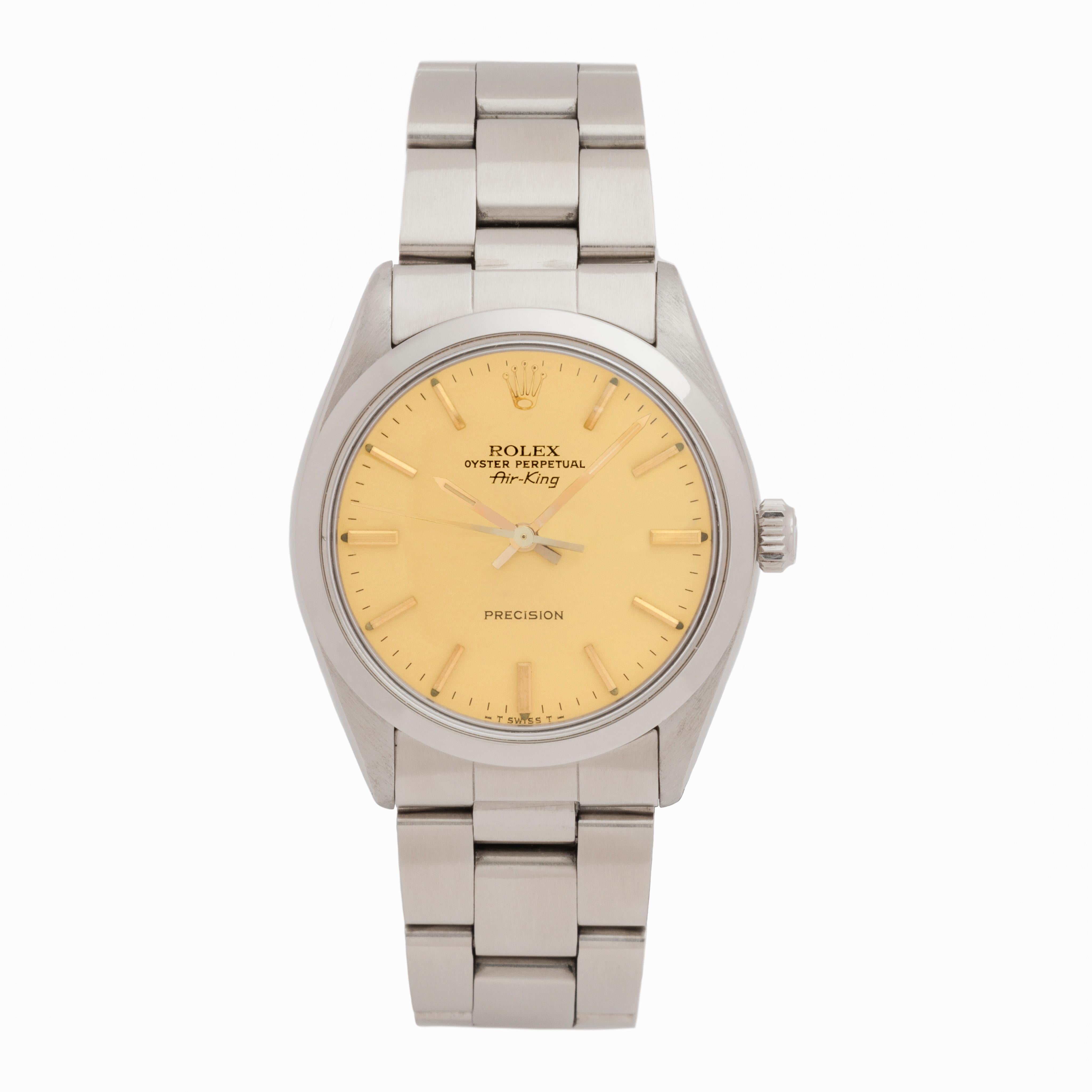 Vintage Rolex Air-King 
Model 5500 
Stainless Steel 
Yellow/Gold Original Dial  
c.1987

Stephanie Windsor guarantees the proper functioning of this watch mechanism for ONE year from the purchase date. Our watches are guaranteed to be of the period,