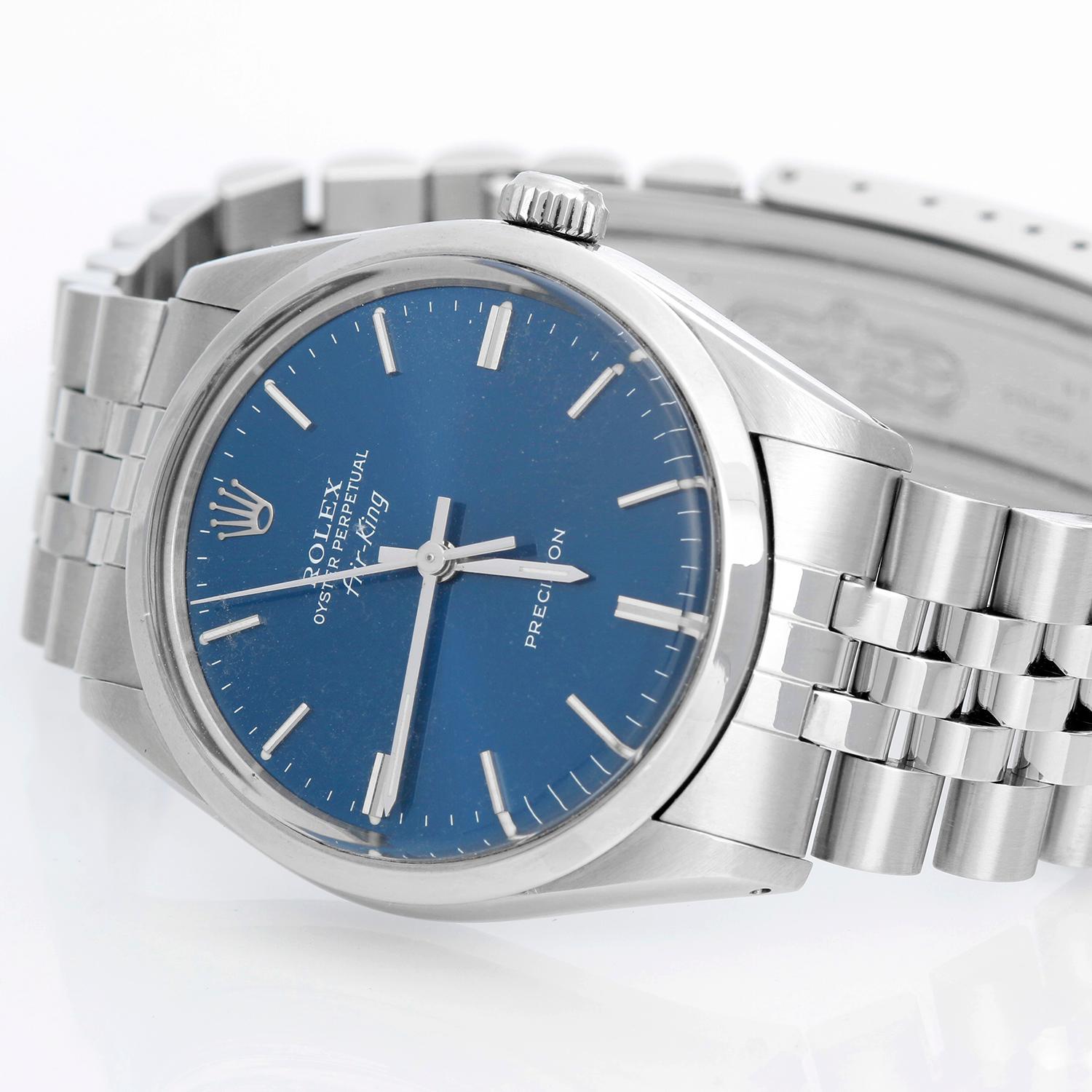 Vintage Rolex Air-King Men's Stainless Steel Oyster Perpetual Watch 5500 - Automatic winding, acrylic crystal. Stainless steel case with smooth bezel (34mm diameter). Blue dial with stick hour markers . Stainless steel Jubilee bracelet . Pre-owned