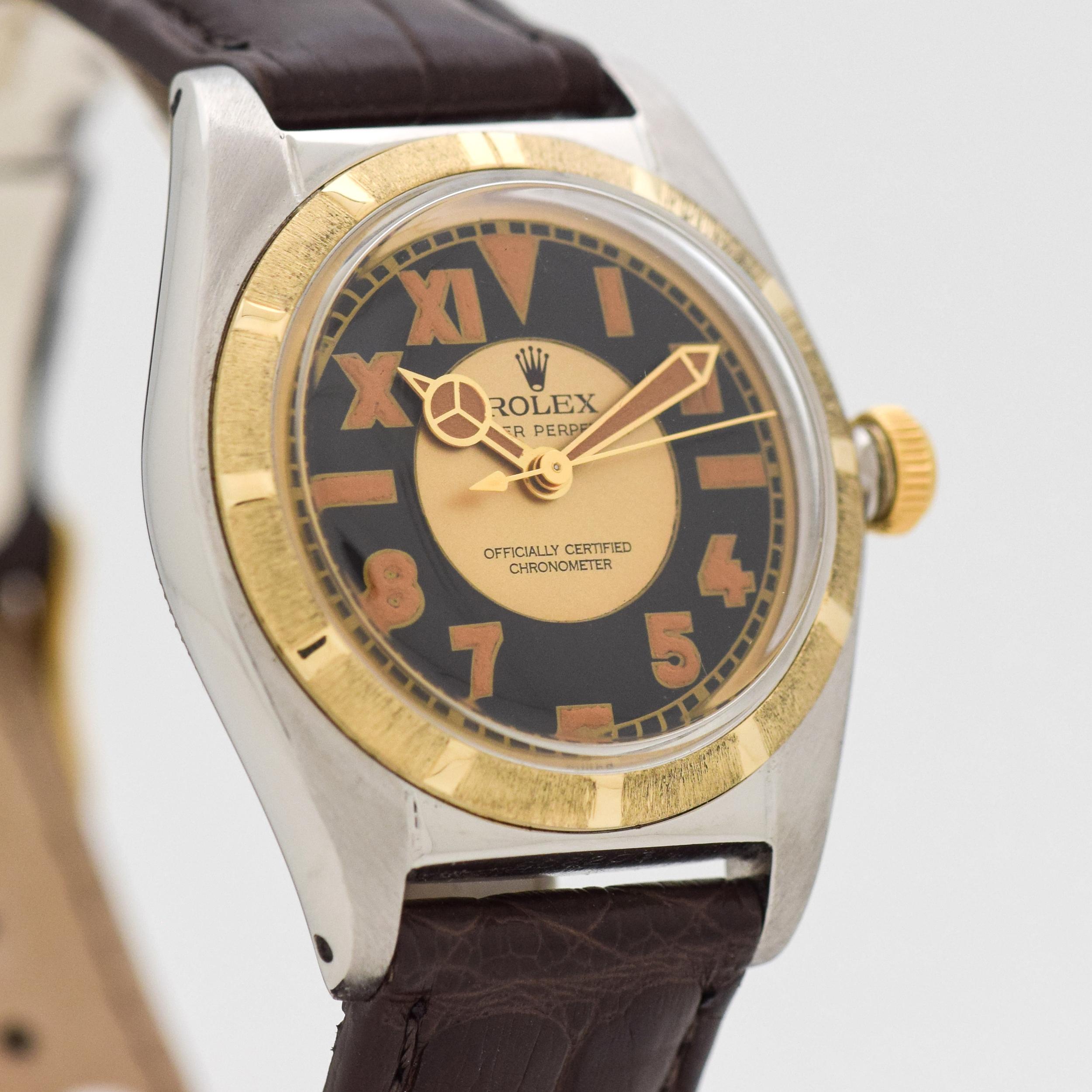 1948 Vintage Rolex Bubbleback Ref. 4392 Two Tone 14k Yellow Gold Machined Bezel and Stainless Steel watch with Two Tone Black and Gold Roman Arabic California Dial. 32mm x 38mm lug to lug (1.26 in. x 1.5 in.) - Powered by a 17 jewel, automatic
