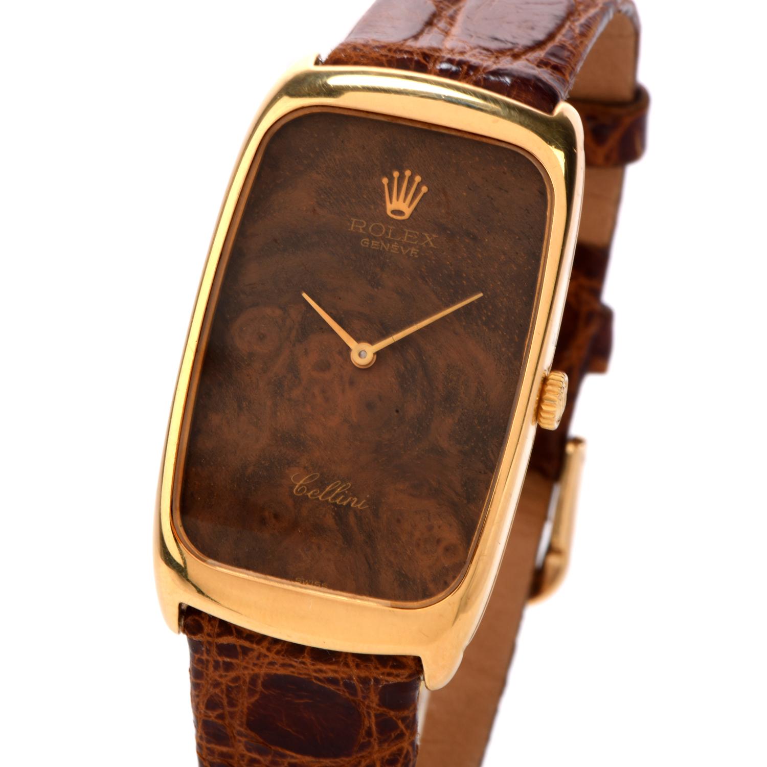 Be exemplary and professional with this handsome Vintage Rolex Cellini 18K Gold Wood Dial Leather Watch.  This watch
 has an elongated cushion-shaped 18 karat yellow gold case with a rare brown wooden dial with Rolex mechanical winding Movement.  