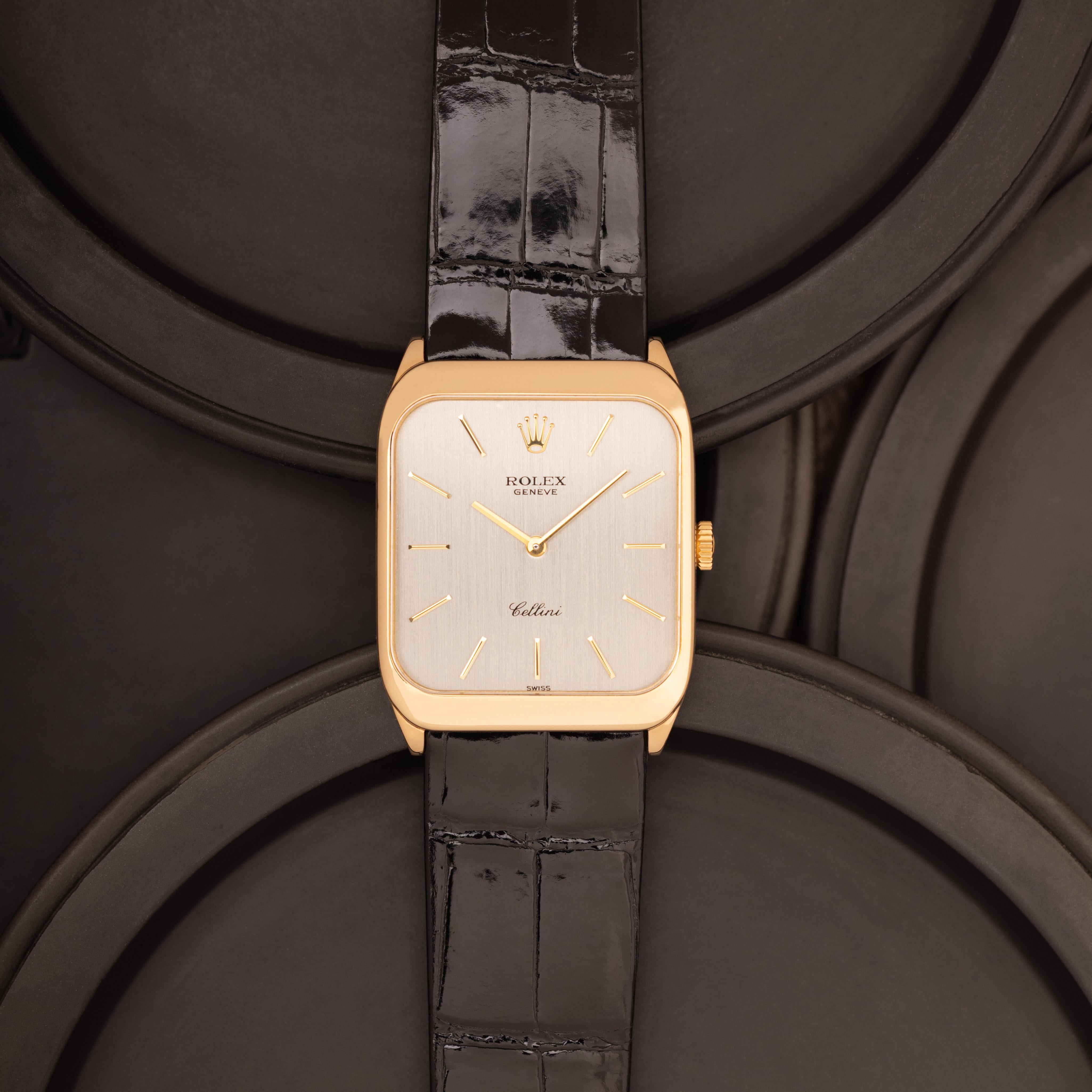 Vintage Rolex Cellini 18k Yellow Gold Model 4135
Silver Dial, Black Rolex strap
Manual Wind with Original Box and Papers 
c.1990 
Made in Switzerland

Stephanie Windsor guarantees the proper functioning of this watch mechanism for ONE year from the