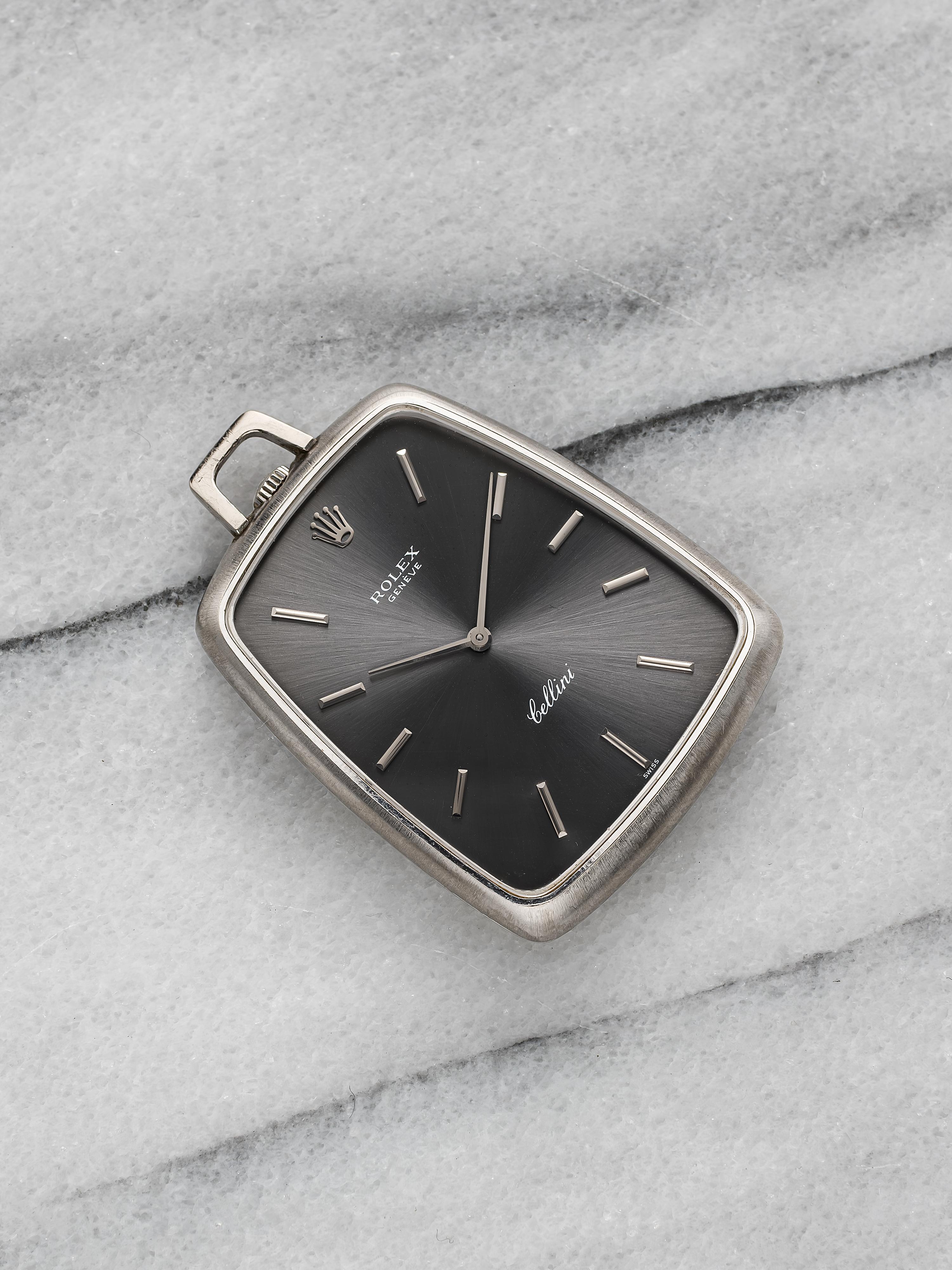 Here’s a Rolex Cellini reference 3727 pocket watch manual wind in 18K white gold with a grey sunburst dial from the 1970s. Weighs around 40 grams. Crown is at 12 a clock. Caliber 1600. In honest condition. Original case, dial, bracelet, and