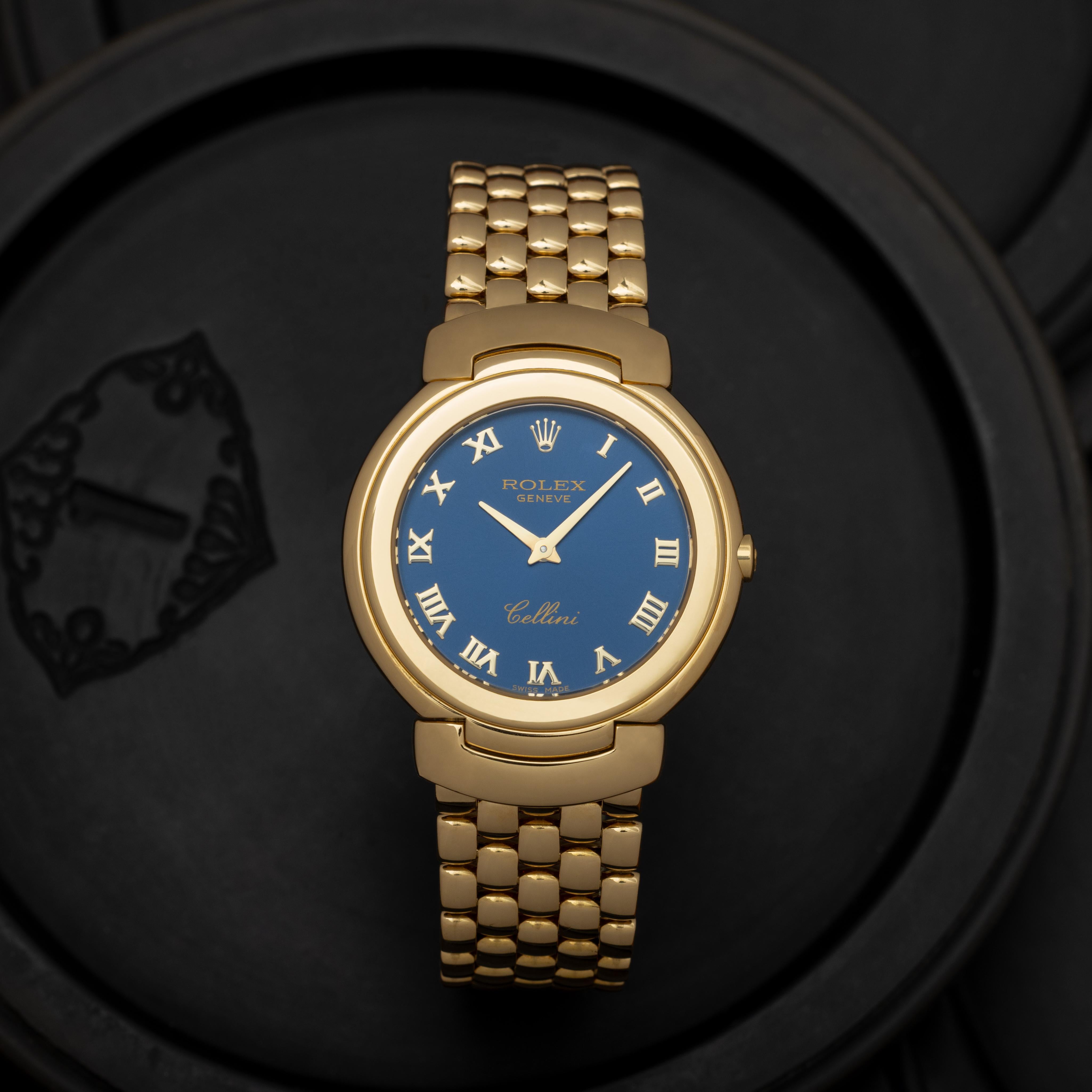 Vintage Rolex Cellini Model 6622 33mm 18k Yellow Gold Rare Blue Dial with Roman Numeral Markers Large size 
Manual Movement
Deployment Buckle
Made in Switzerland 
c. 1991


Stephanie Windsor guarantees the proper functioning of this watch mechanism