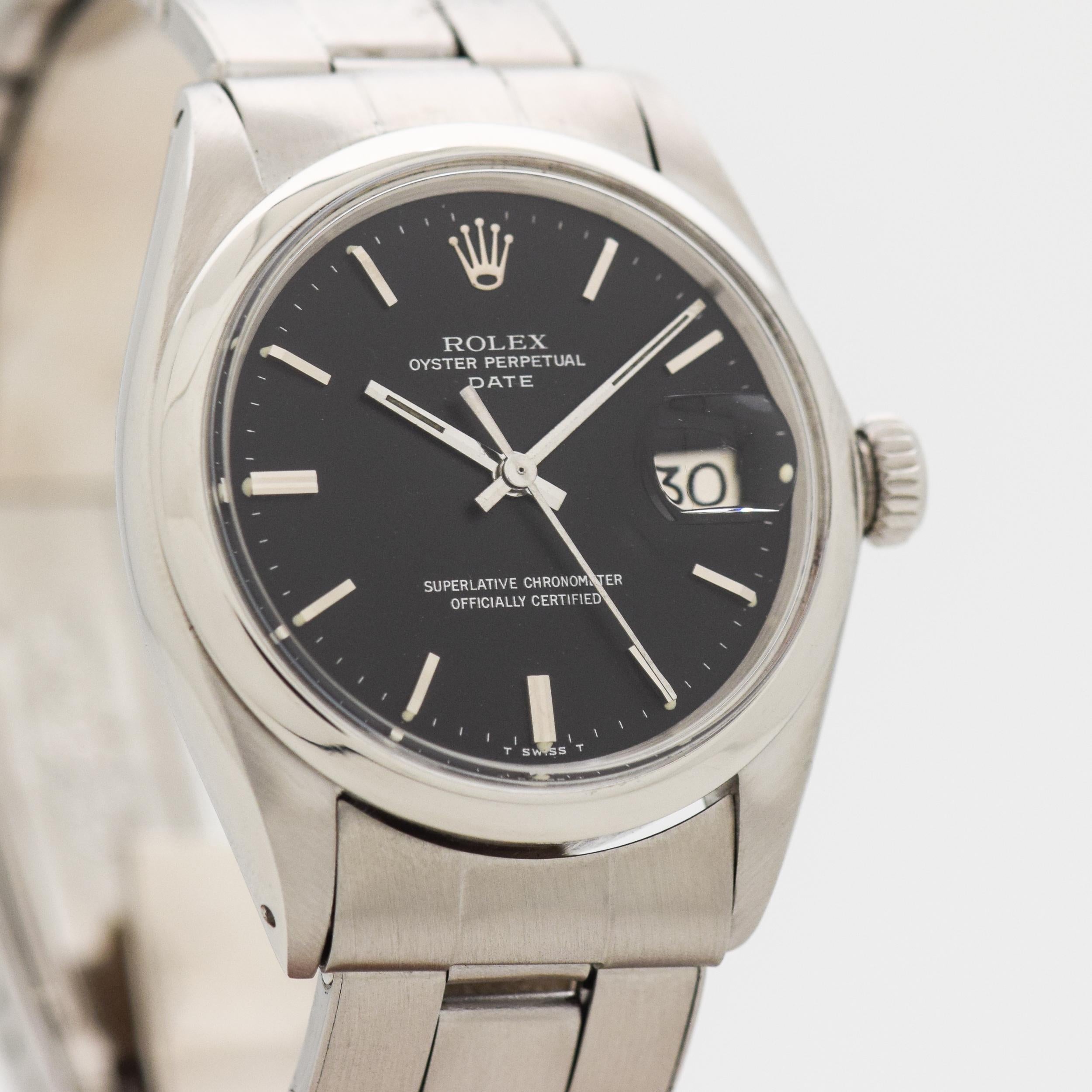 1969 Vintage Rolex Oyster Perpetual Date Automatic Ref. 1500 Stainless Steel watch with Original Black Dial with Applied Steel Rare Sloping Steel Bar/Baton Markers with Original Rolex Stainless Steel Oyster Bracelet. 35mm x 41mm lug to lug (1.38 in.