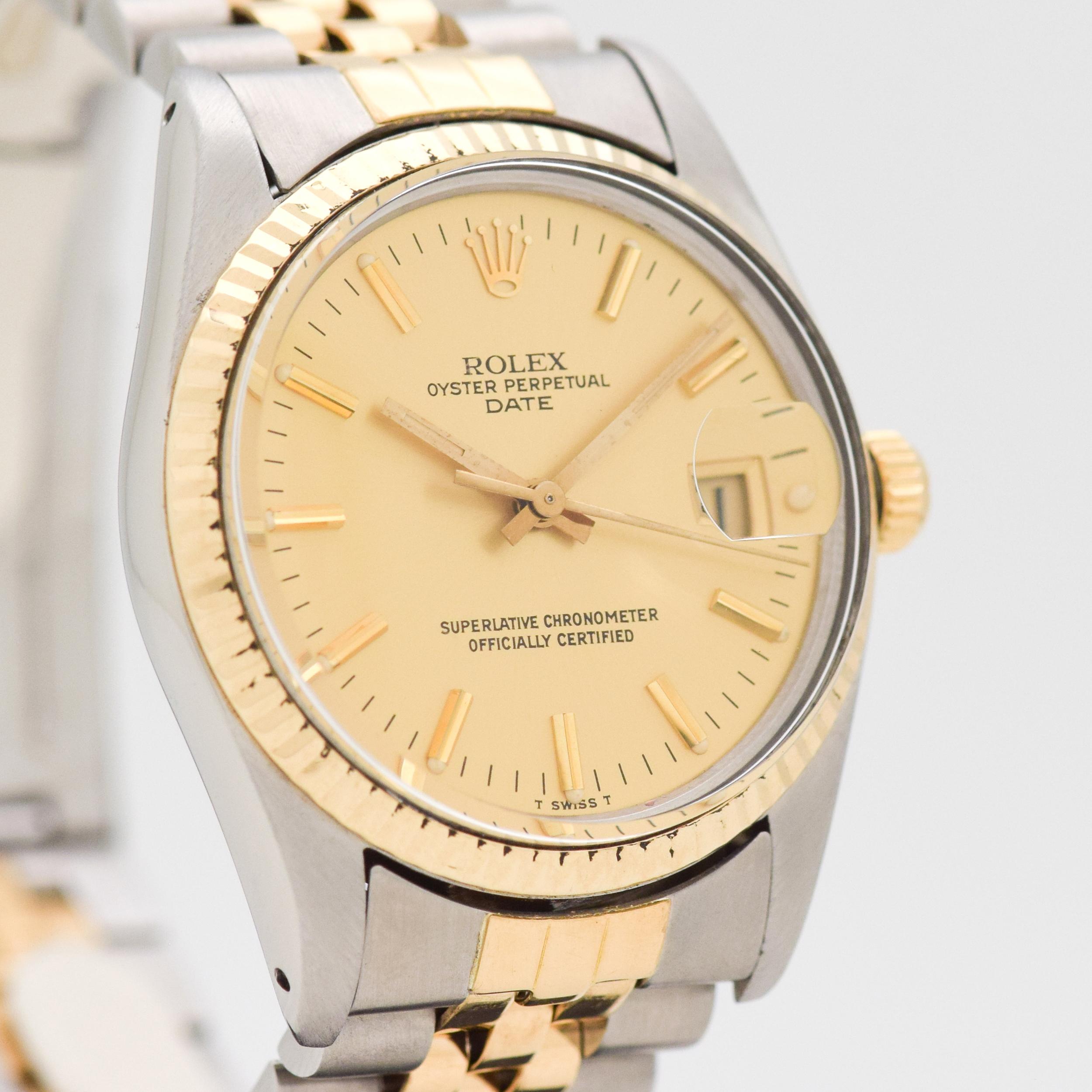 1981 Vintage Rolex Date Automatic Reference 15000. 18K Yellow Gold & Stainless Steel case. Fluted bezel. Quick-set function. Great looking, champagne dial. Powered by a 27-jewel, automatic caliber movement. Equipped with an 18K Yellow Gold &