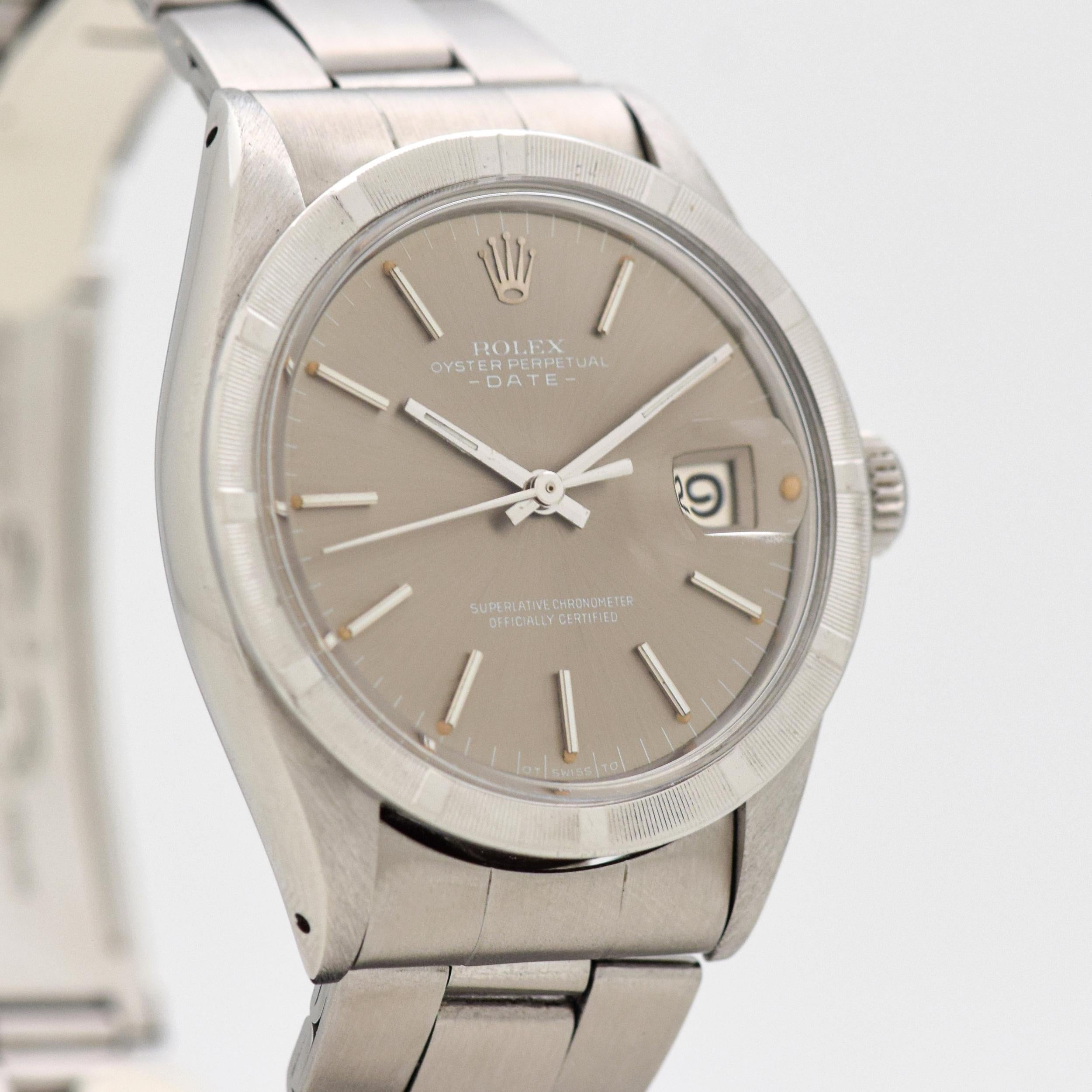 1971 Vintage Rolex Date Automatic Reference 1501 Stainless Steel Watch. Case size, 35mm wide. Features a stainless steel, machined bezel. Grey dial with date function. Powered by an automatic caliber movement. Equipped with an original, Rolex Oyster