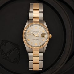 Vintage Rolex Date Model 15203 Stainless Steel and 18 Karat Yellow Gold Watch