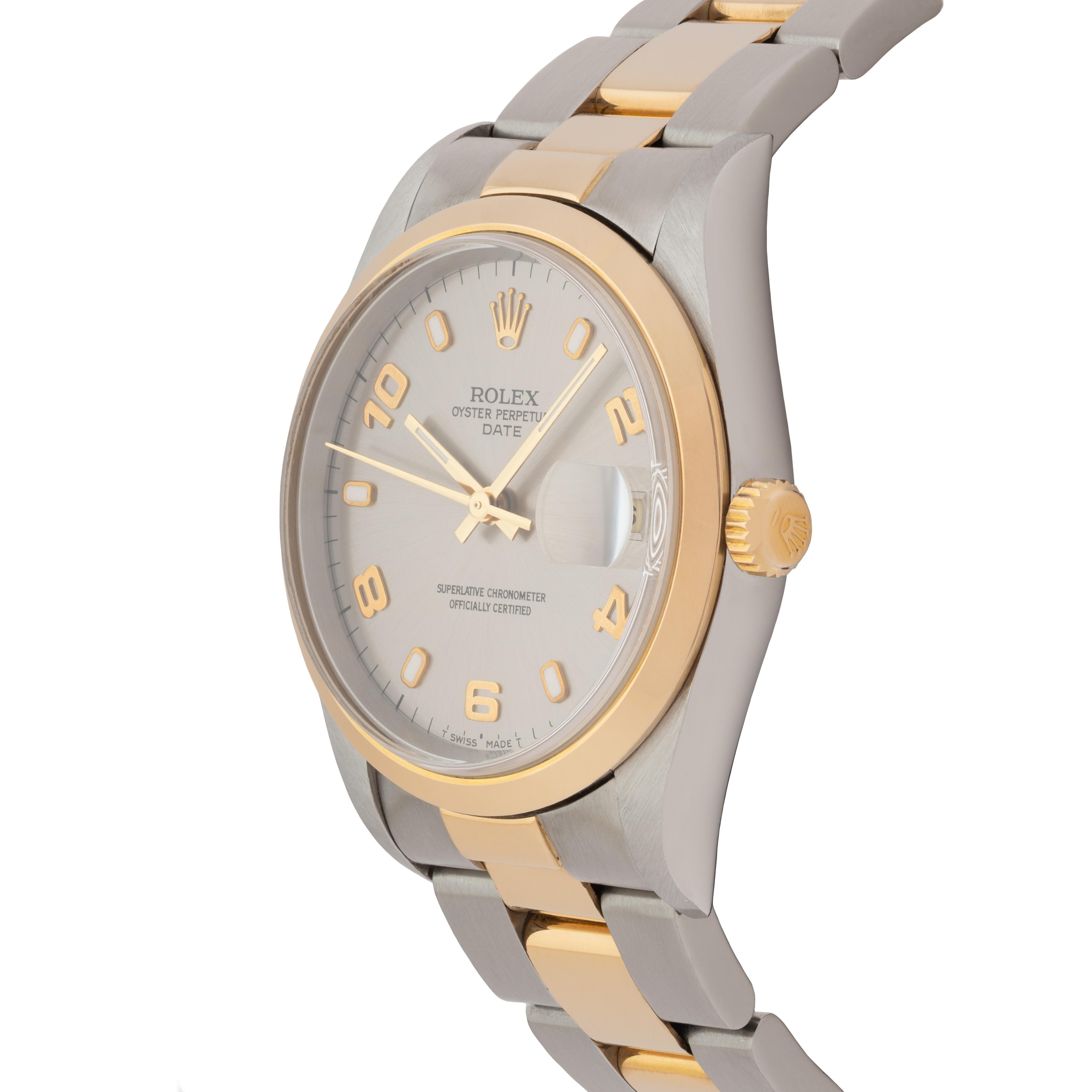 Vintage Rolex Date Model 15203 Stainless Steel and 18 Karat Yellow Gold Watch In Good Condition In New York, NY