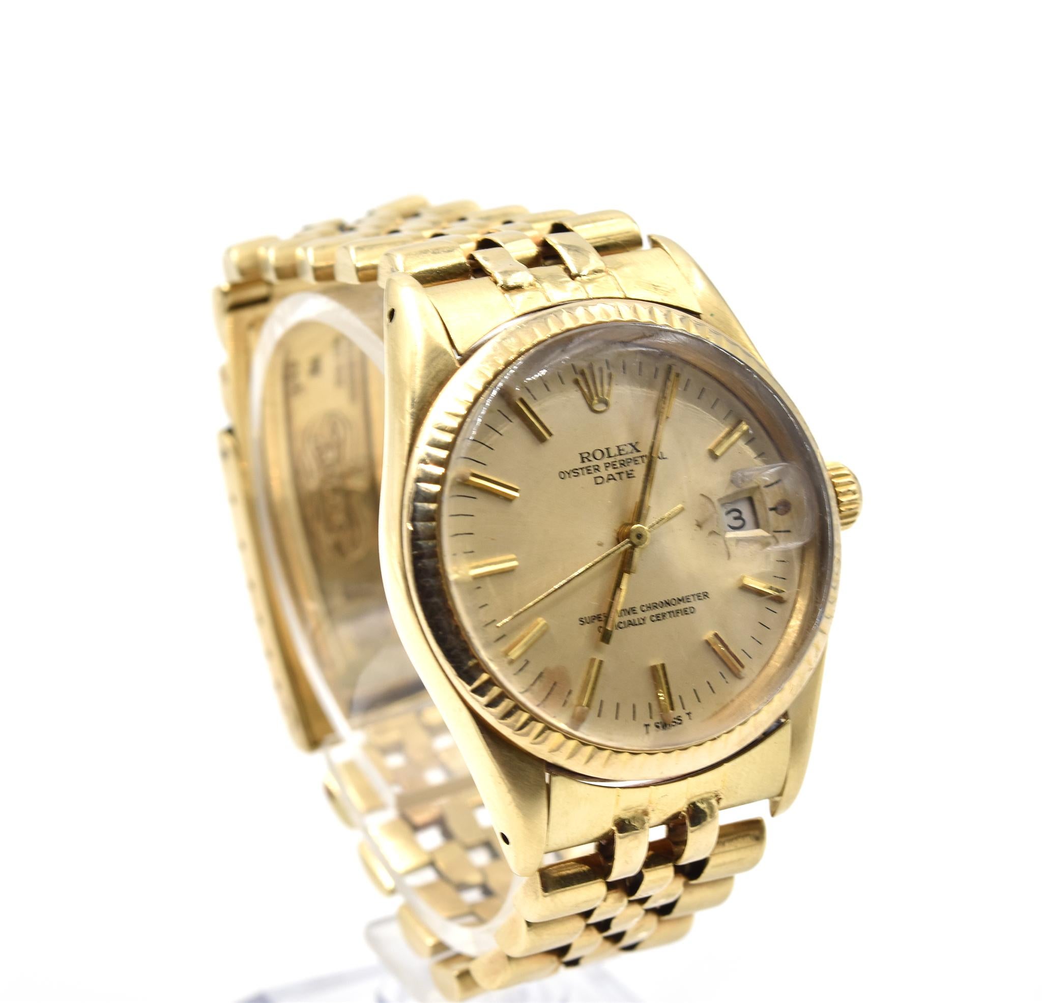 Movement: automatic
Function: hours, minutes, seconds, date
Case: 36mm 14k yellow gold case, 14k yellow gold fluted bezel, plastic crystal, 14k yellow gold screw-down crown
Dial: champagne dial with gold luminescent hands, black indexes, date at 3