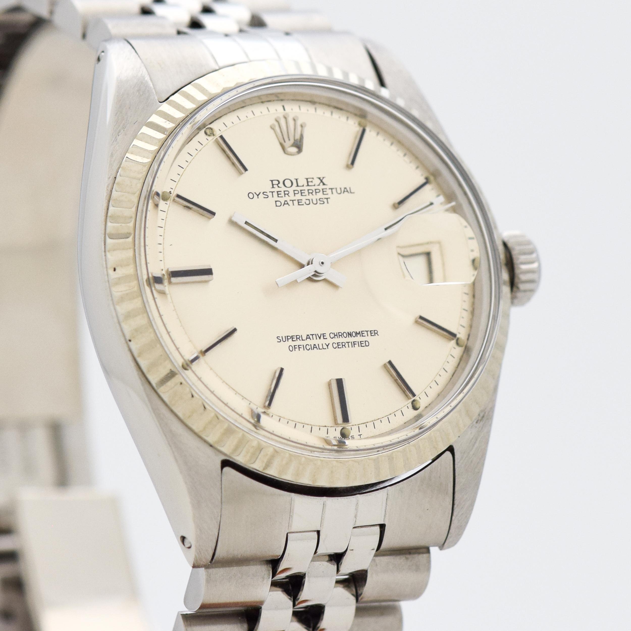 1977 Vintage Rolex Datejust Ref. 1601 14k White Gold Fluted Bezel and Stainless Steel watch with Original Silver Dial with Applied Steel Beveled Stick/Bar/Baton Markers with Black Inlay with Original Rolex Stainless Steel Jubilee Bracelet. 36mm x
