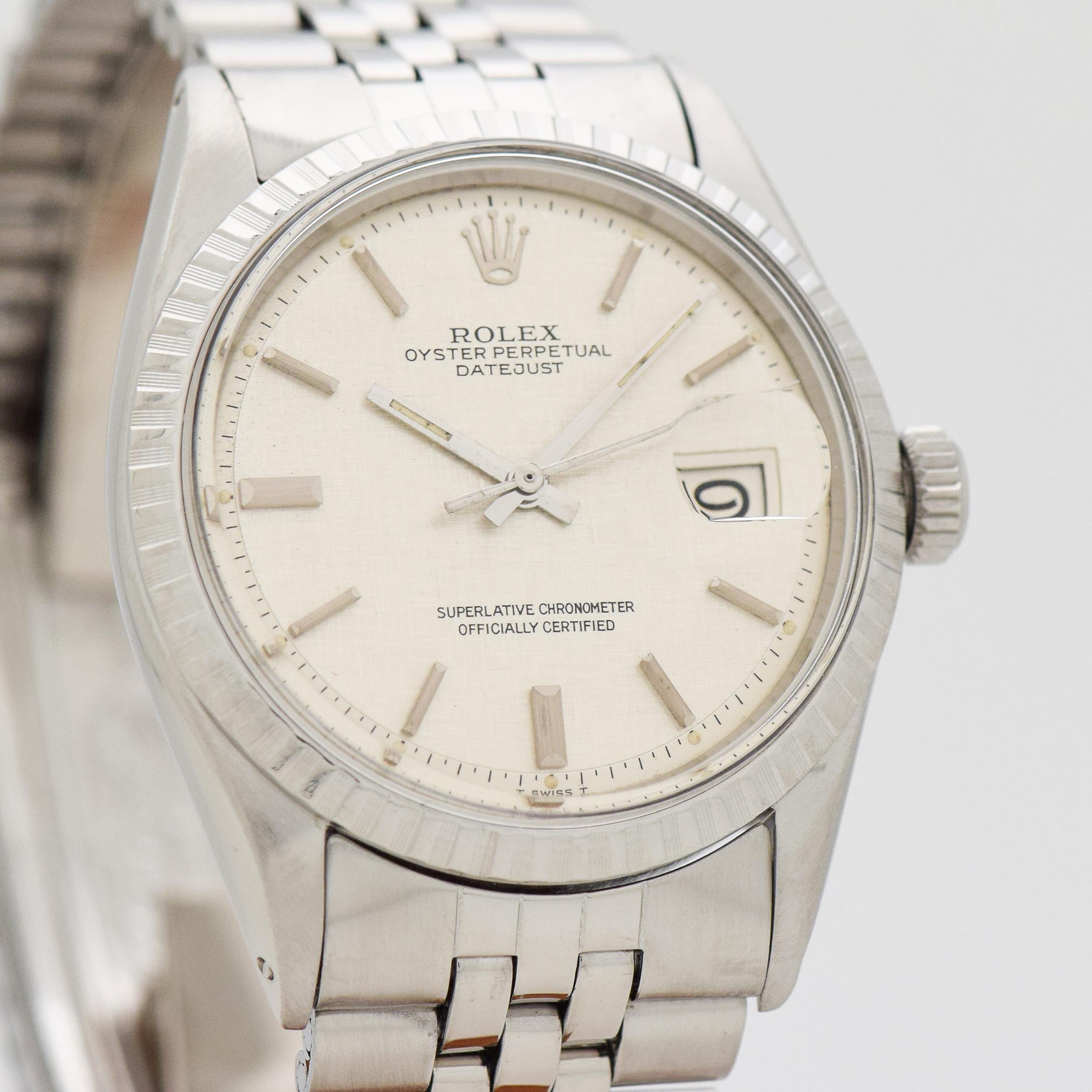 1972 Vintage Rolex Datejust Ref. 1603 Stainless Steel watch with Fluted Steel Bezel with Original Rare Linen Textured Silver Dial with Applied Steel Rounded Stick/Bar/Baton Markers with Original Rolex Stainless Steel Jubilee Bracelet. 36mm x 43mm