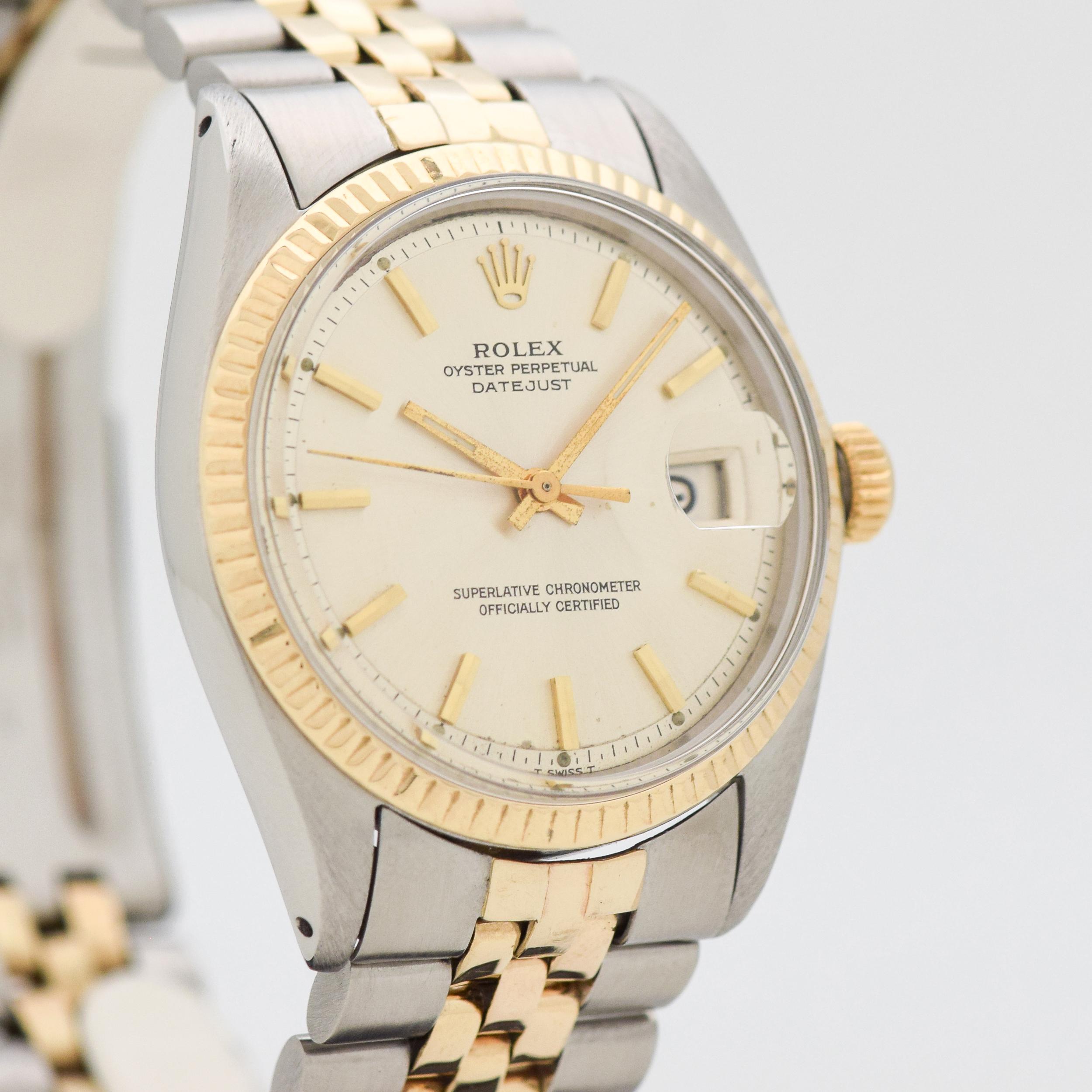1968 Vintage Rolex Datejust Ref. 1601 Two Tone 14k Yellow Gold and Stainless Steel watch with Original Silver Dial with Unique Applied Gold Color Beveled Stick/Bar/Baton Markers with Original Rolex Two Tone 14k Yellow Gold and Stainless Steel