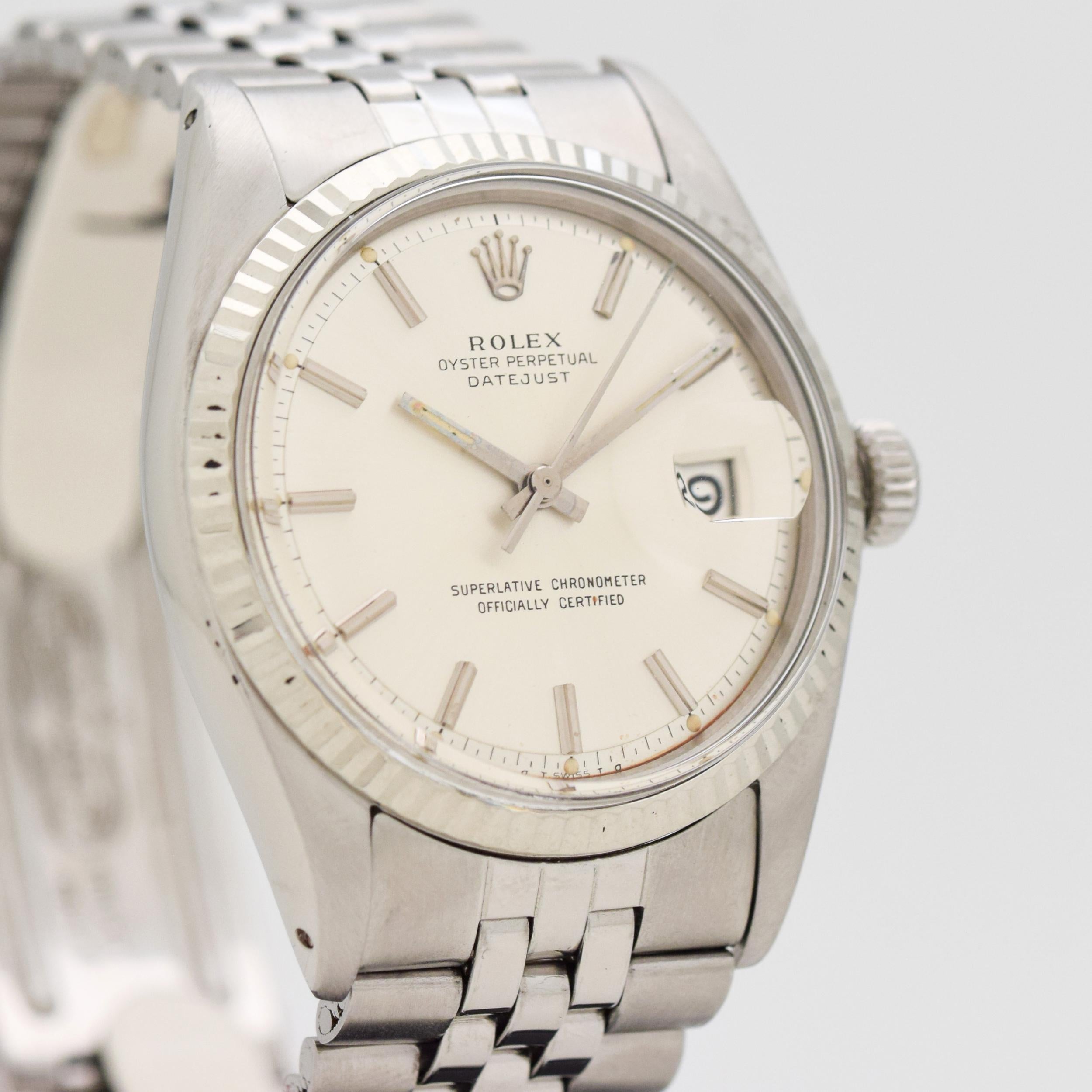 1973 Vintage Rolex Datejust Reference 1601. 14K White Gold & Stainless Steel case. Silver dial with applied, baton markers. OT Swiss TO dial. Powered by a 26-jewel, automatic caliber movement. Equipped with an original, Rolex Stainless Steel Jubilee