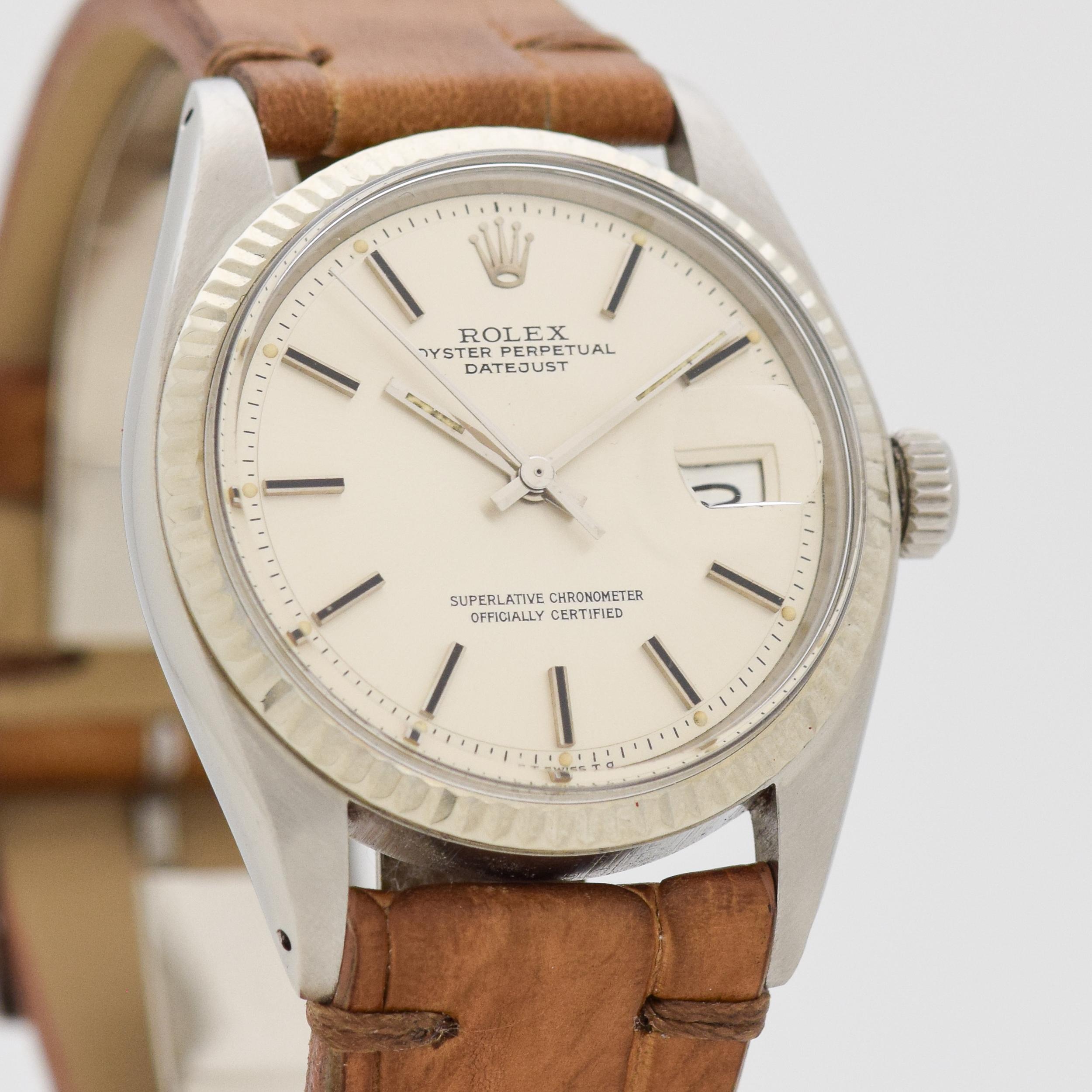 1977 Vintage Rolex Datejust Ref. 1601 14k White Gold Fluted Bezel with Stainless Steel Case watch with Original Silver Dial with Applied White Gold Stick/Bar/Baton Markers. 36mm x 43mm lug to lug (1.42 in. x 1.69 in.) - 26 jewel, automatic caliber