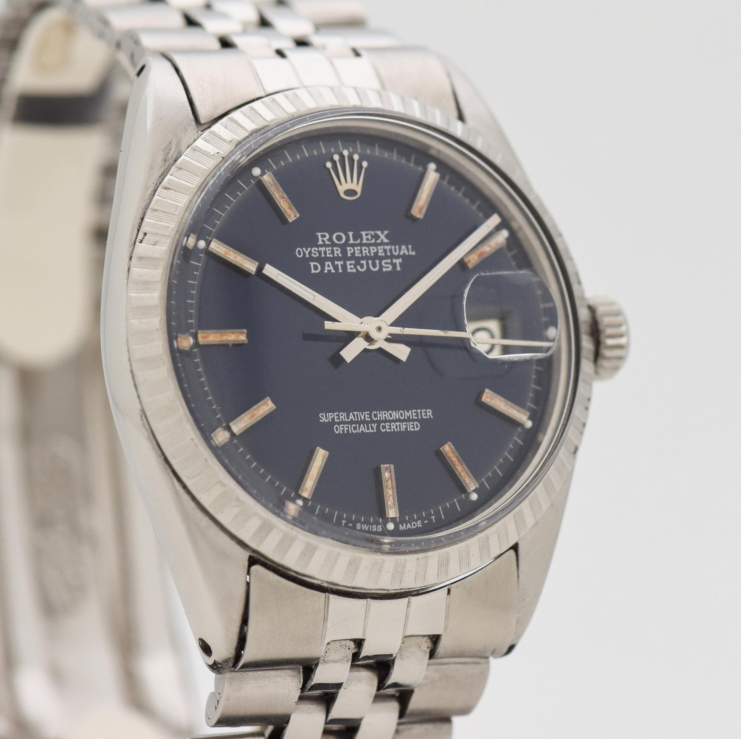 1963 Vintage Rolex Datejust Ref. 1603 Stainless Steel watch with Genuine Rolex Replacement Blue Dial with Applied Steel Inverted Beveled Stick/Bar/Baton Markers with Original Rolex Stainless Steel Jubilee Bracelet. Case size, 36mm x 43mm lug to lug