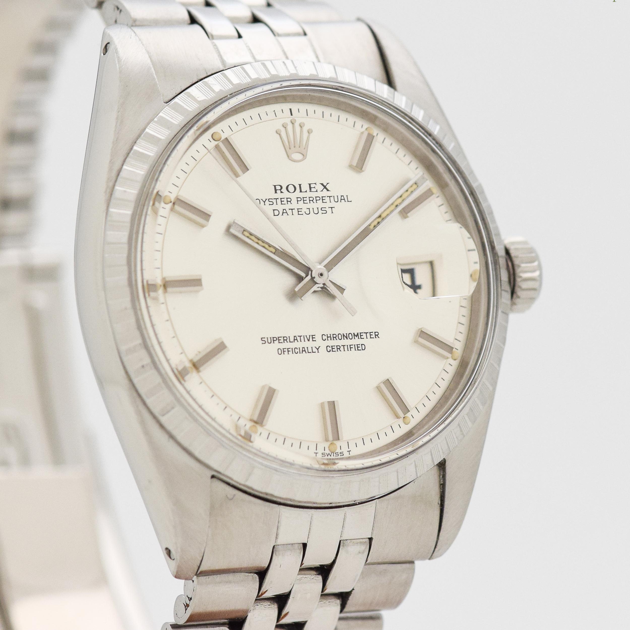 1970 Vintage Rolex Datejust Ref. 1603 Fluted Bezel Stainless Steel Watch with Original Wide Boy Silver Dial with Wide Stick/Bar/Baton Markers with Original Rolex Stainless Steel Jubilee Bracelet. 36mm x 43mm lug to lug (1.42 in. x 1.69 in.) - 26