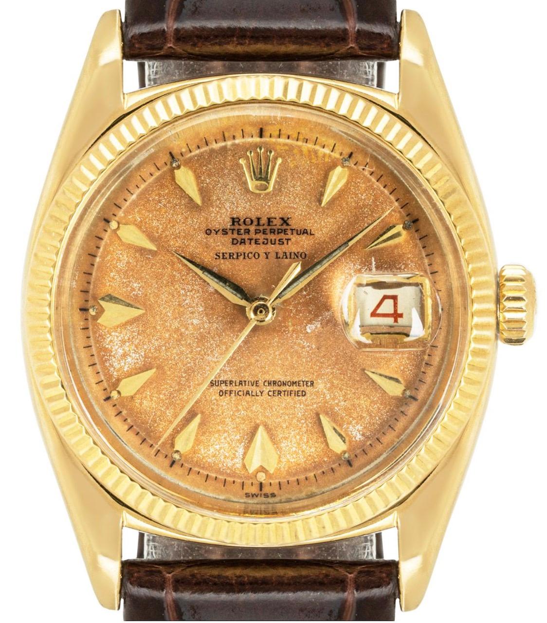 A stunning vintage Rolex Datejust in yellow gold with a unique Patina dial signed by Serpico y Laino at 12 o'clock. Featuring applied dagger hour markers and a red and black roulette date wheel, with an open 6 and 9.

This timepiece was originally