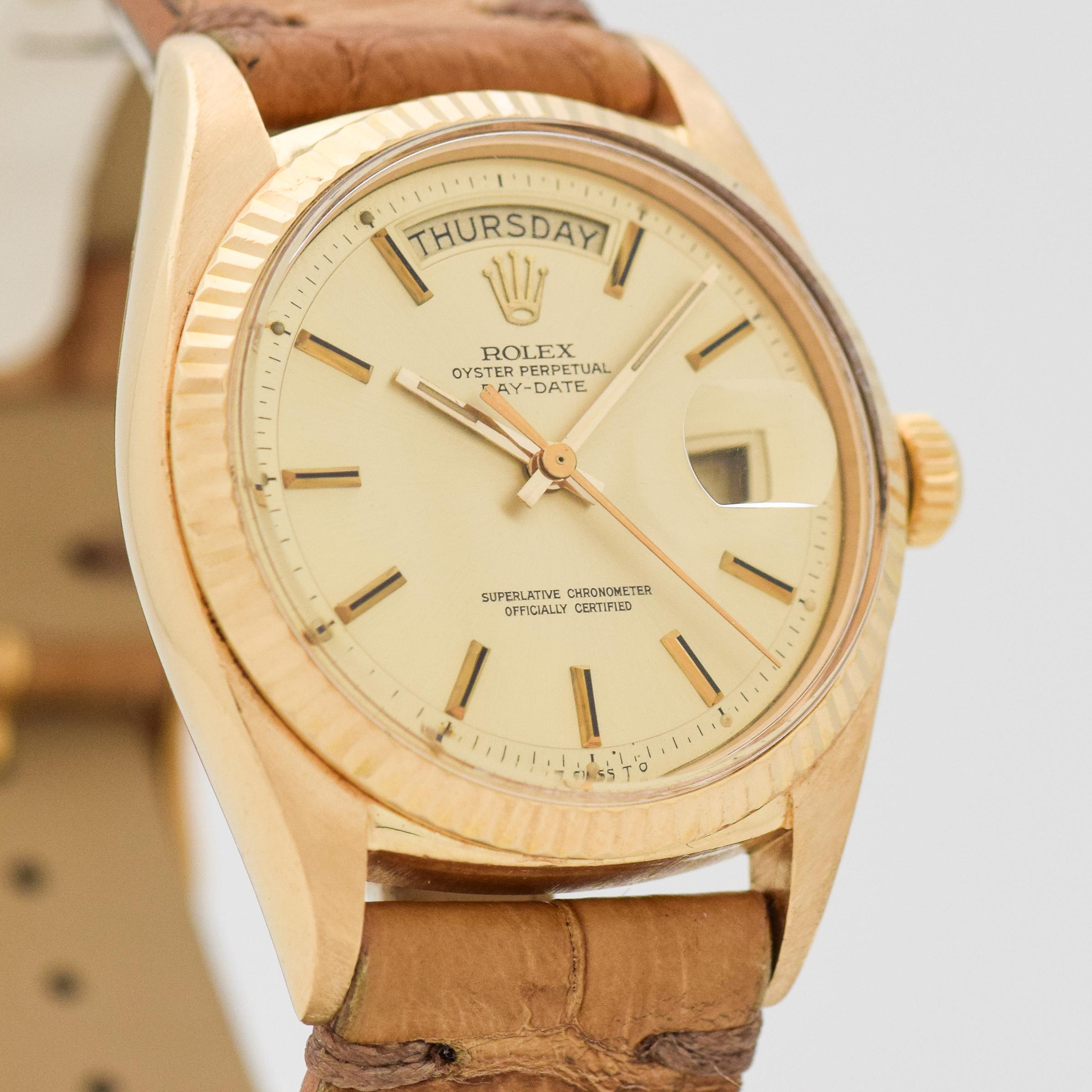 1970 Vintage Rolex Day-Date President Ref. 1803 18k Yellow Gold watch with Original Champagne Dial with Applied 18k Yellow Gold Beveled Stick/Bar/Baton Markers with Black Inserts. 36mm x 43mm lug to lug (1.42 in. x 1.69 in.) - 26 jewel, automatic