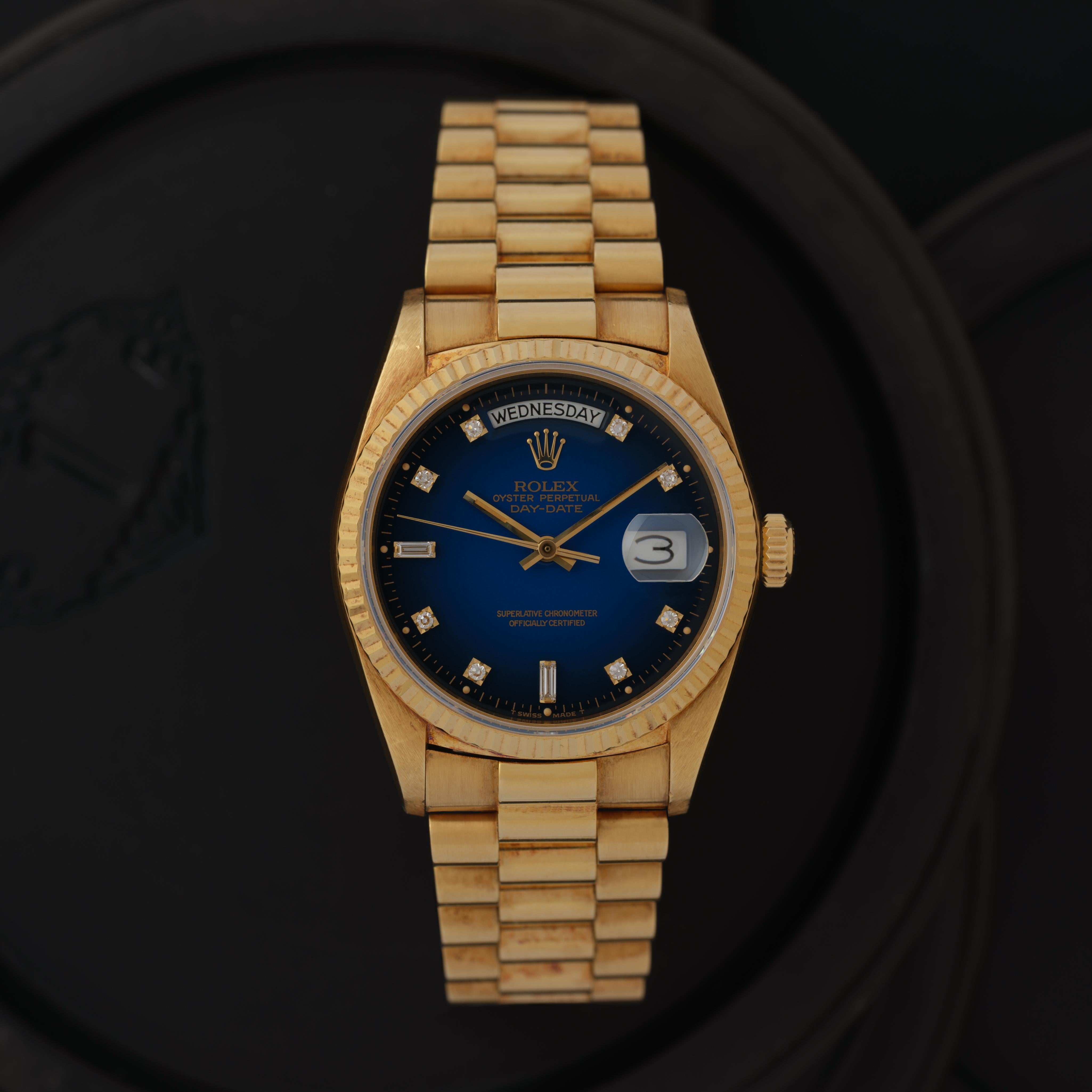 Vintage Rolex DayDate Model 18038 18k Yellow Gold 36mm Blue Vignette Dial with Diamond Markers, Automatic Movement, Made in Switzerland c.1986 with Box and Papers fits up to a 7.8