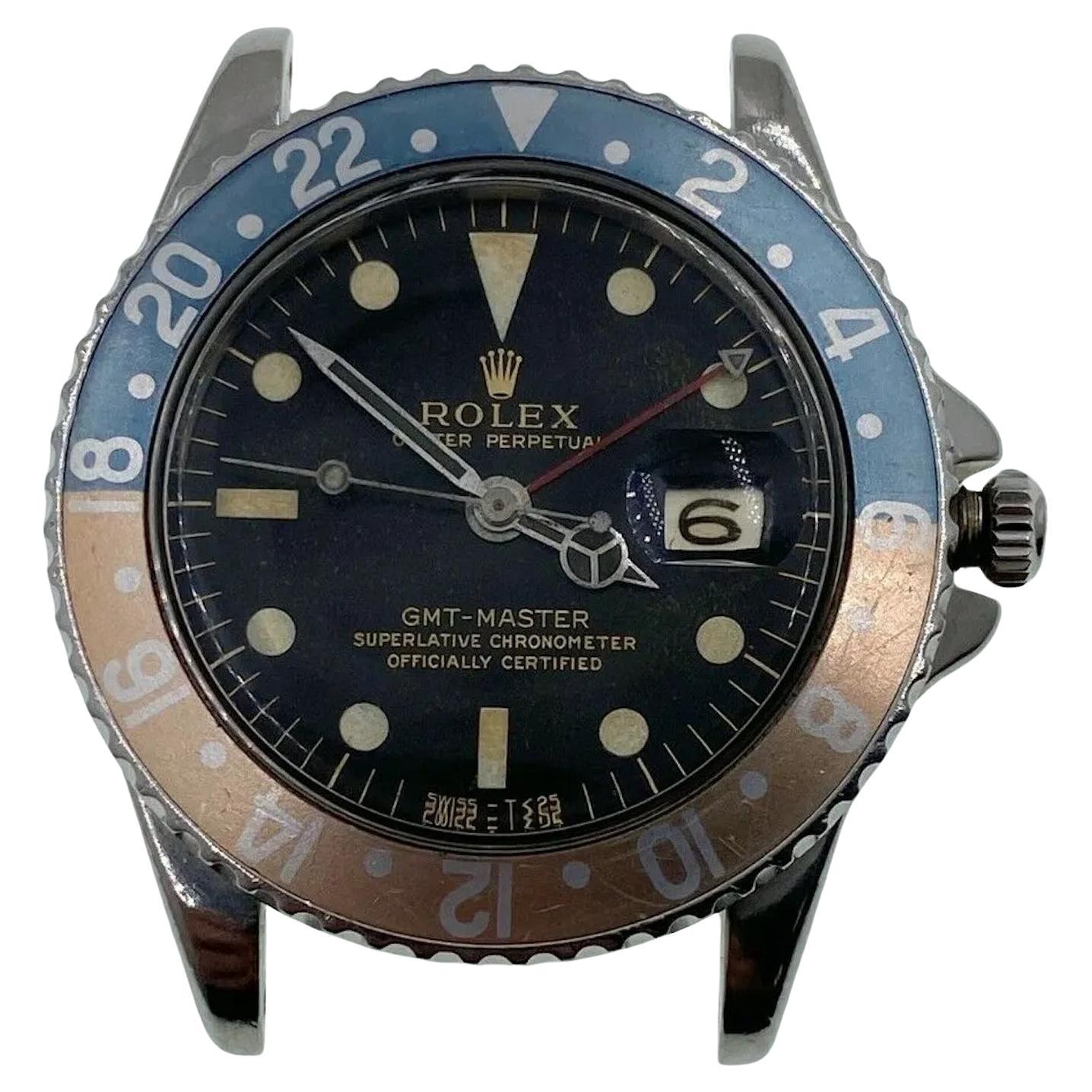 Numero di stile: 1675

Seriale: 1089***

Anno: 1964

Model: Pepsi GMT Master 

Materiale della cassa: Acciaio inossidabile

Fascia: Acciaio inossidabile

Lunetta:  Pepsi sbiadita - Rosso e blu

Quadrante: Quadrante nero dorato lucido 

Viso: