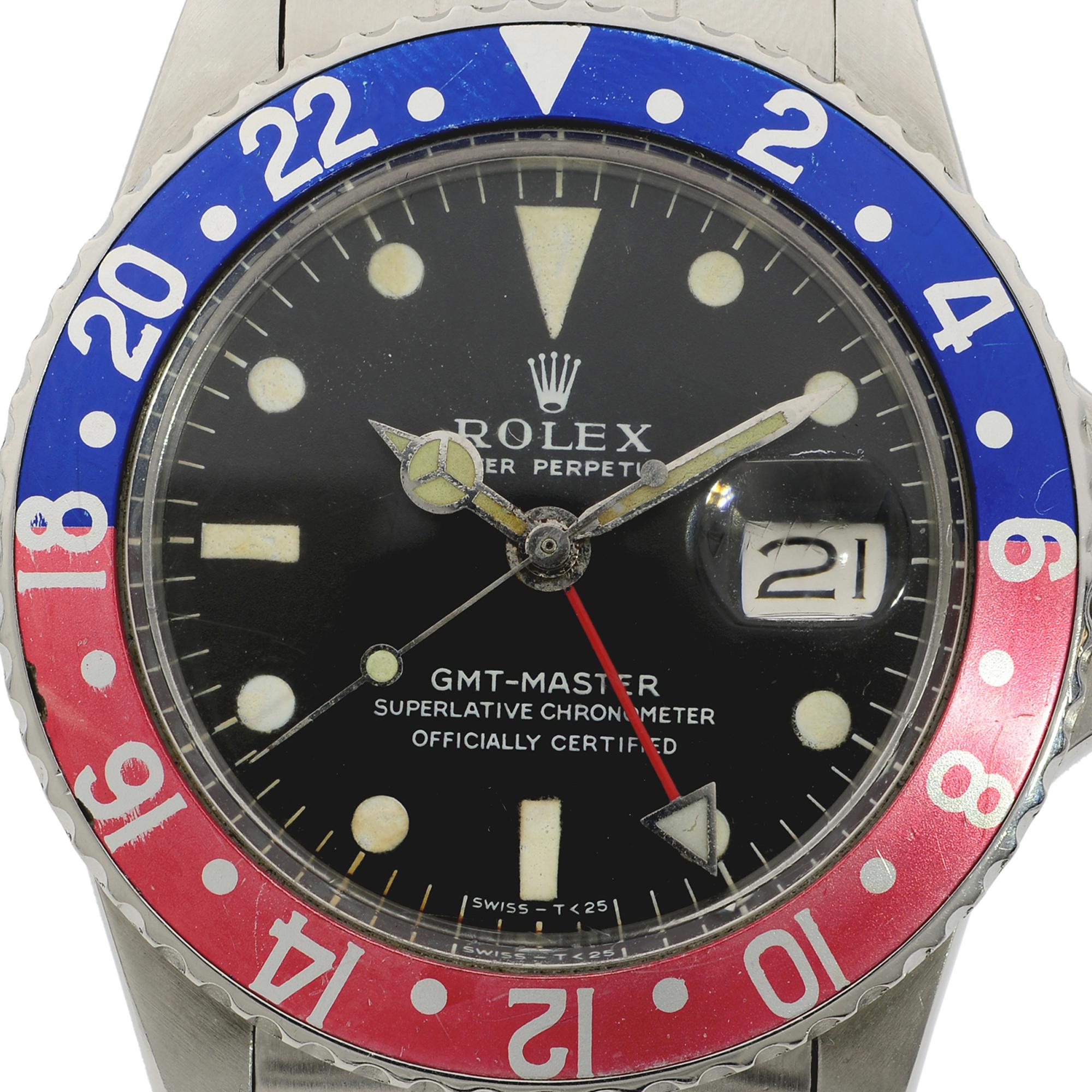 This pre-owned Rolex Gmt-Master 1675 is a beautiful men's timepiece that is powered by mechanical (automatic) movement which is cased in a stainless steel case. It has a round shape face, gmt, date indicator dial and has hand sticks & dots style