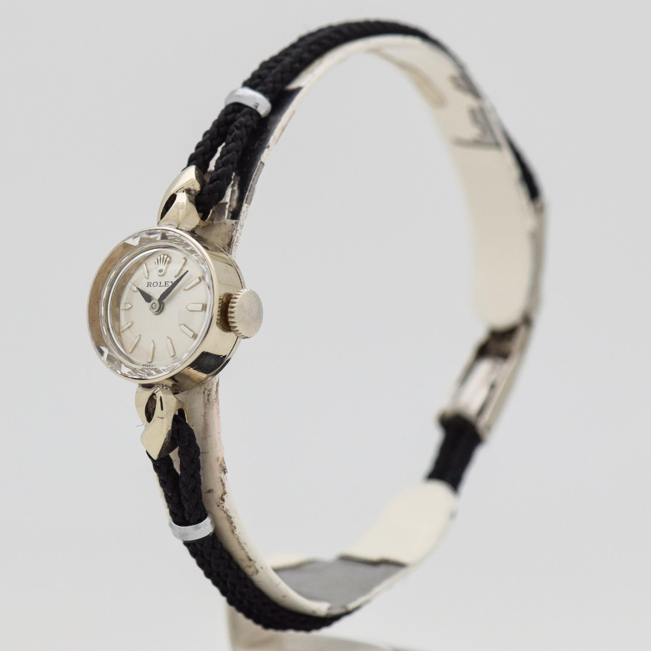 1960's Vintage Rolex Ladies 14k White Gold watch with Silver Dial with Applied Steel Pointed Tip Stick/Bar/Baton Markers. 14mm x 25mm lug to lug (0.55 in. x 0.98 in.) - Powered by a 17-jewel, manual caliber movement. Triple Signed.