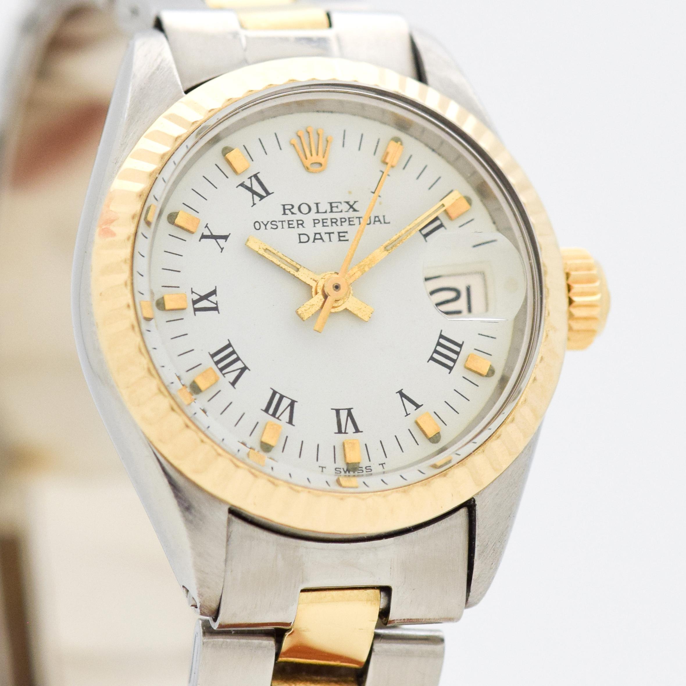 1971 Vintage Rolex Ladies Oyster Perpetual Date Ref. 6917 Two Tine 14k Yellow Gold and Stainless Steel watch with Original White Dual with Applied Gold Wide Rectangular Markers and Black Roman Numerals with Original Rolex Two Tone 14k Yellow Gold